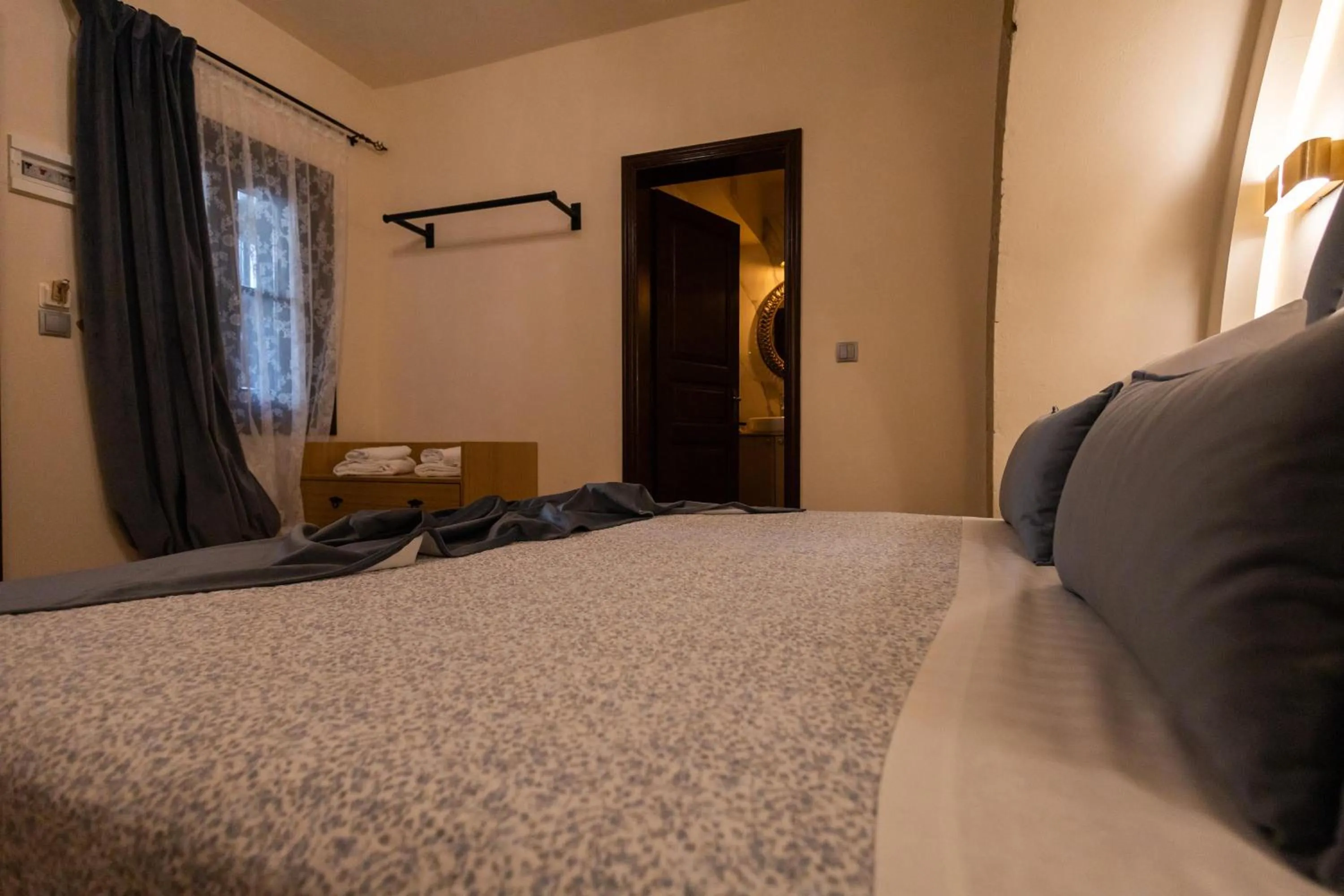 Bed in April Medieval Hotel