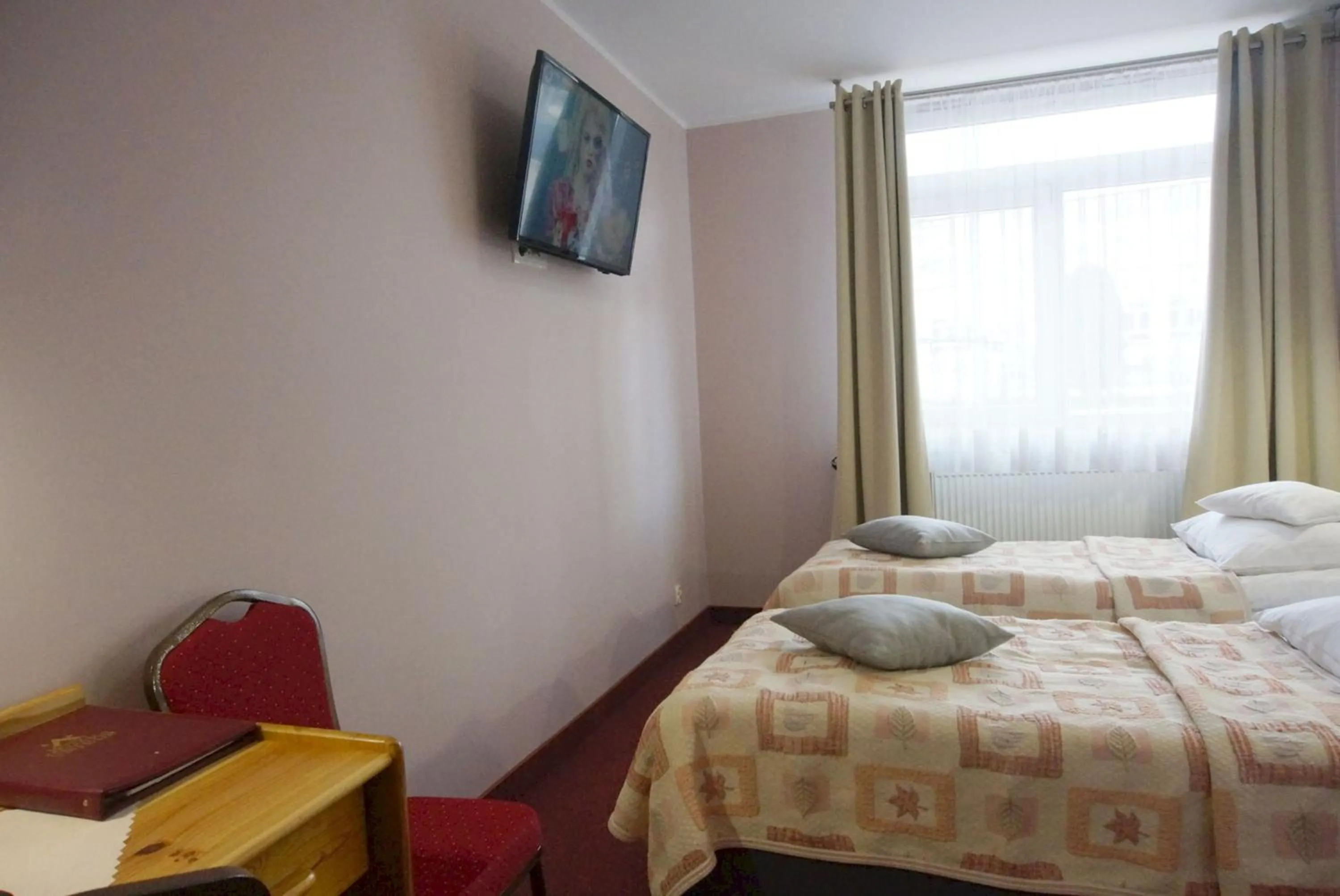 Photo of the whole room, Bed in Hotel Unibus