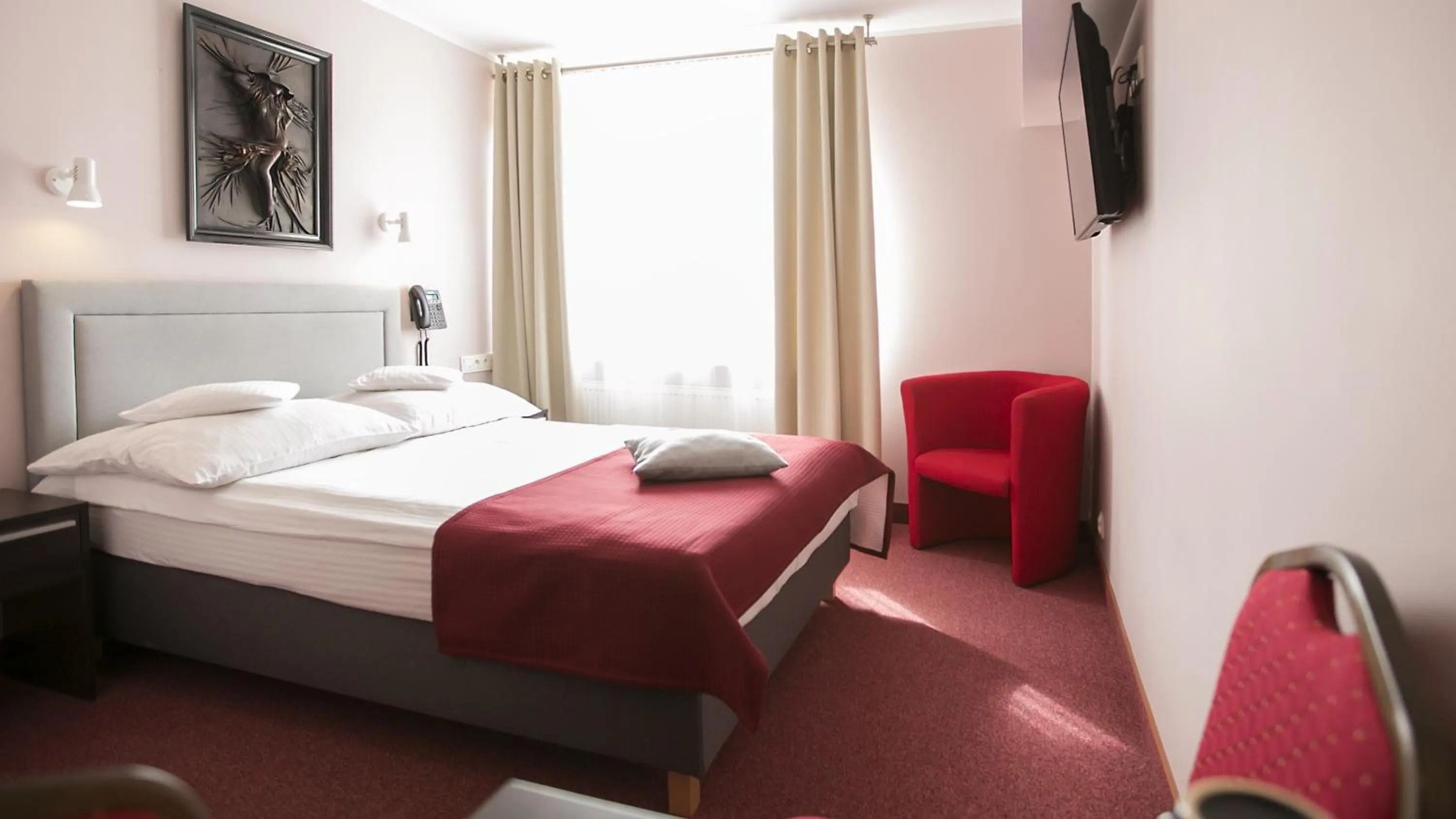 Photo of the whole room, Bed in Hotel Unibus