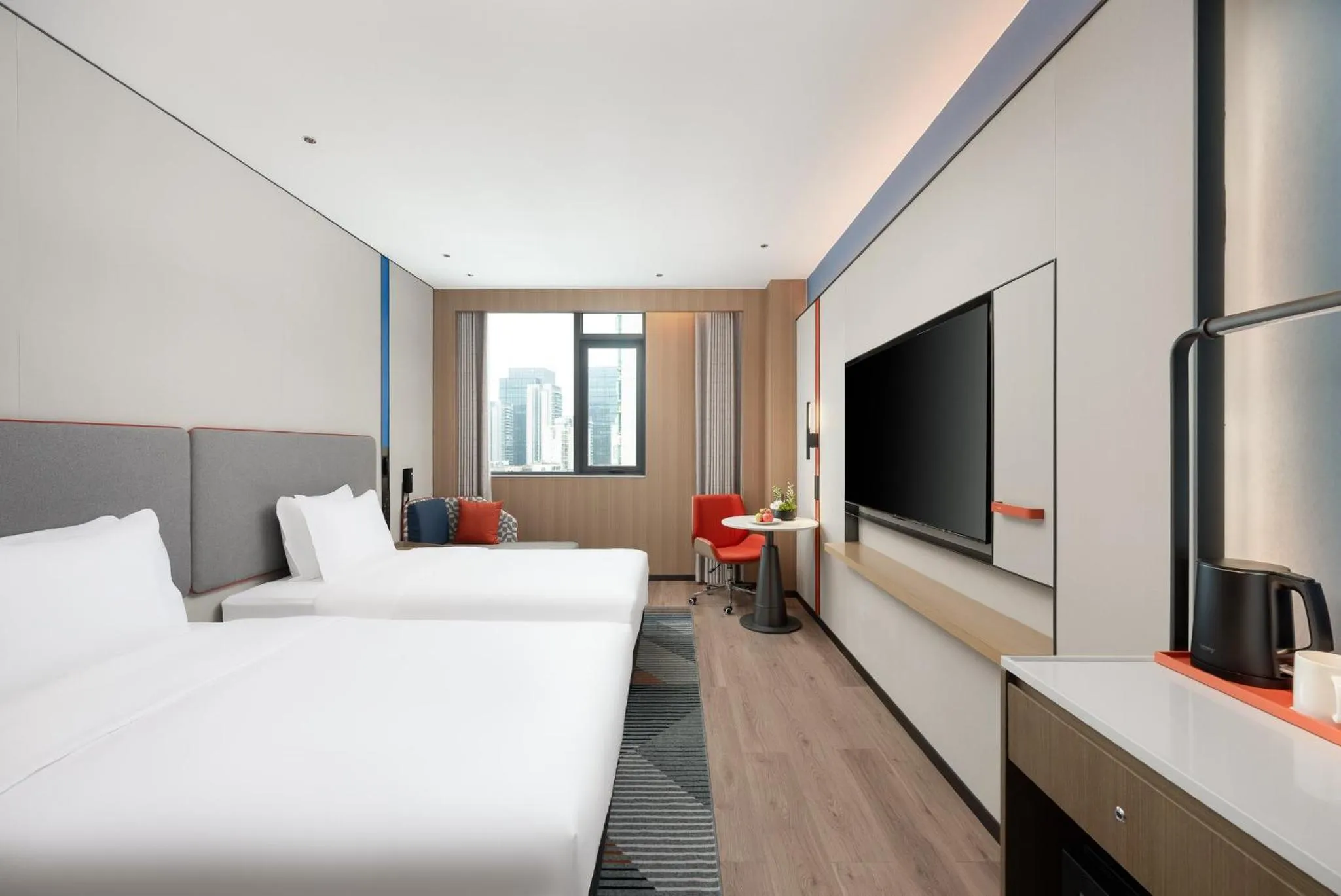 Photo of the whole room, Bed in Holiday Inn Express Haikou World Trade Center by IHG