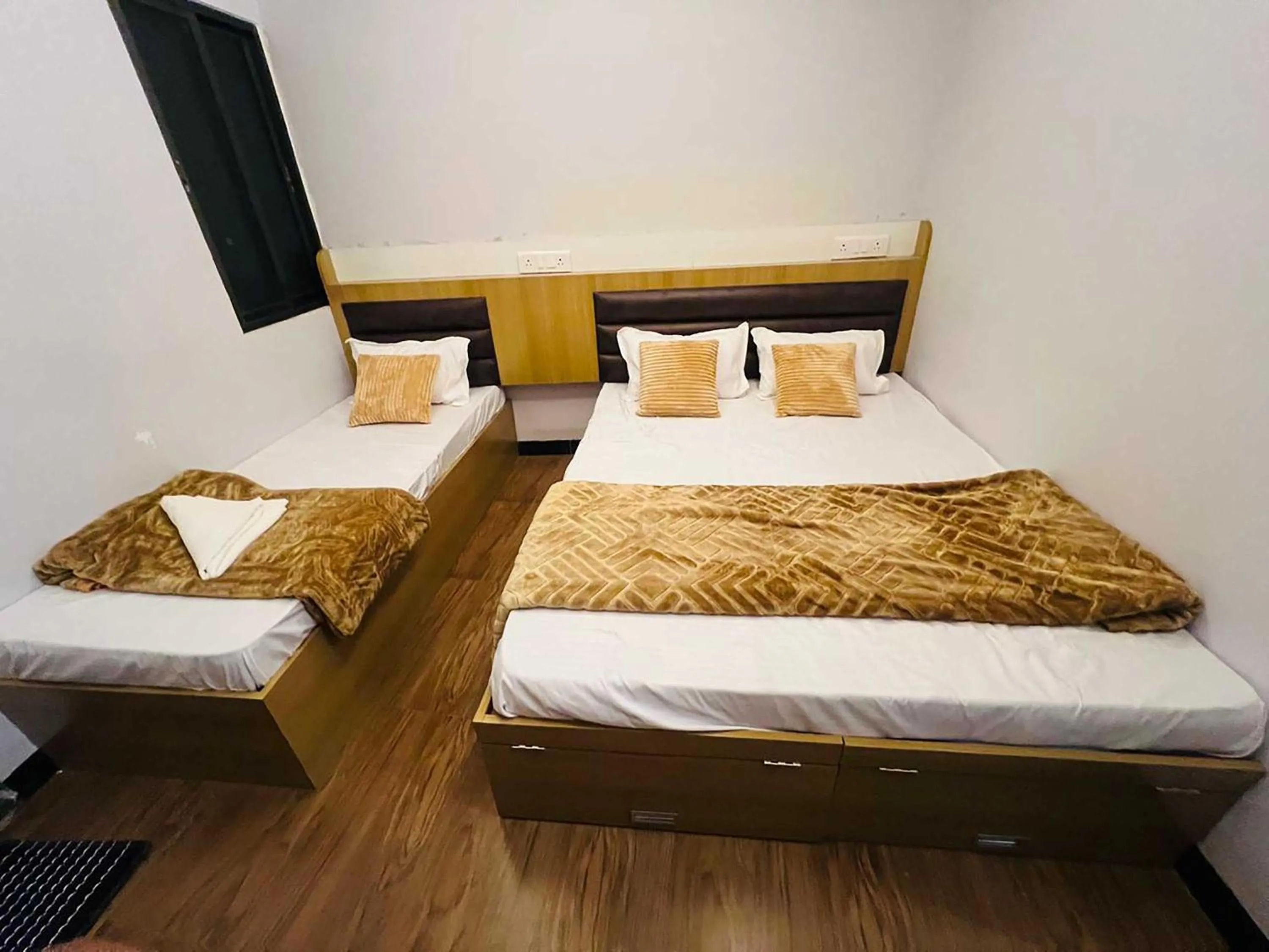 Bed in Hotel Advika Ujjain