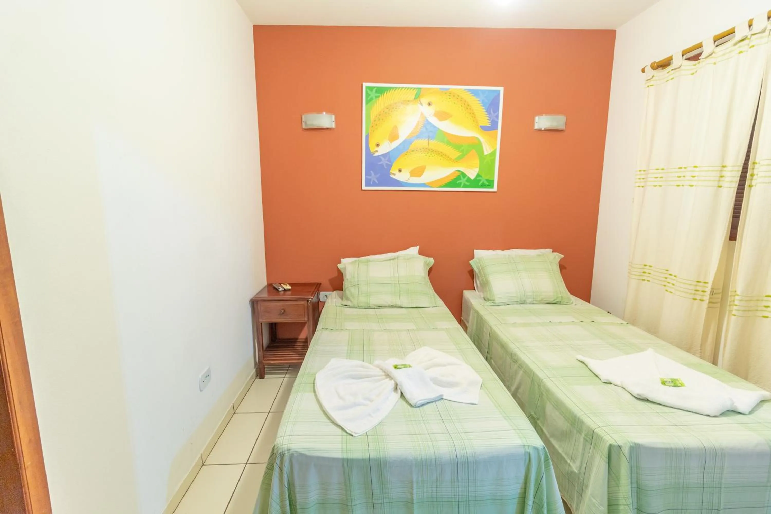 Bed in Pousada Luz do Sol