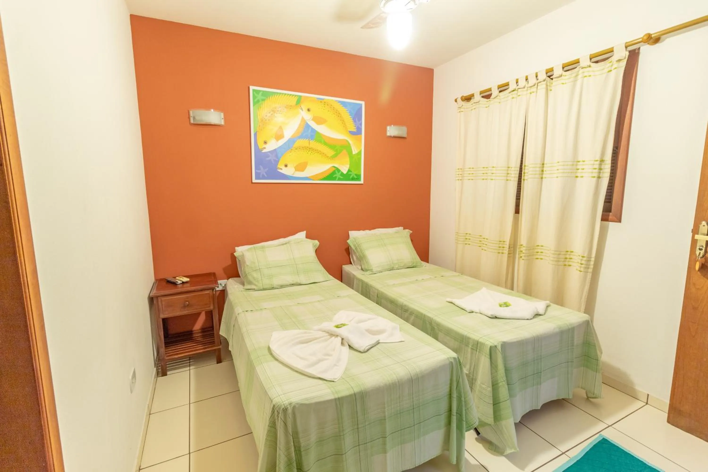 Bed in Pousada Luz do Sol