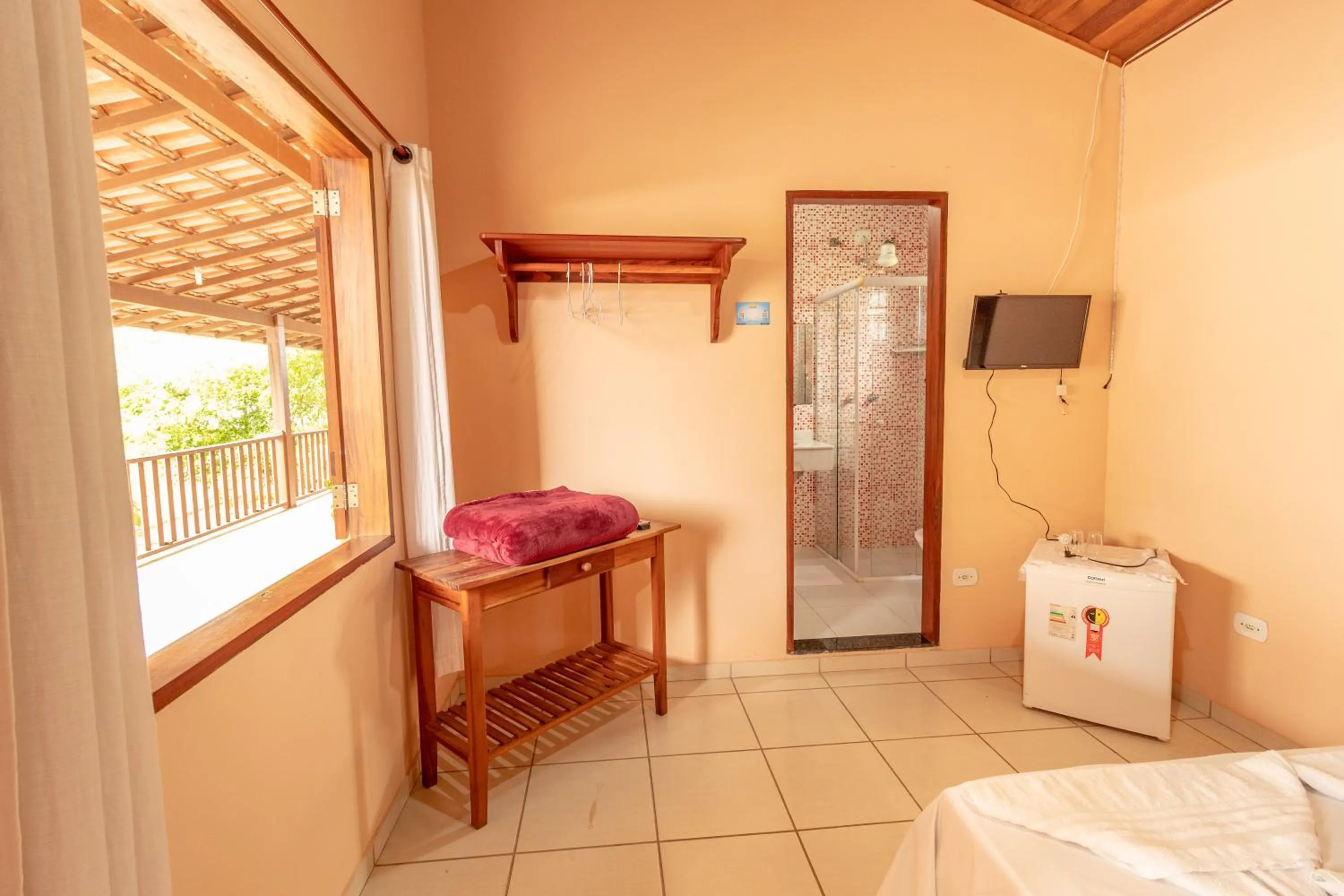 Bed in Pousada Luz do Sol