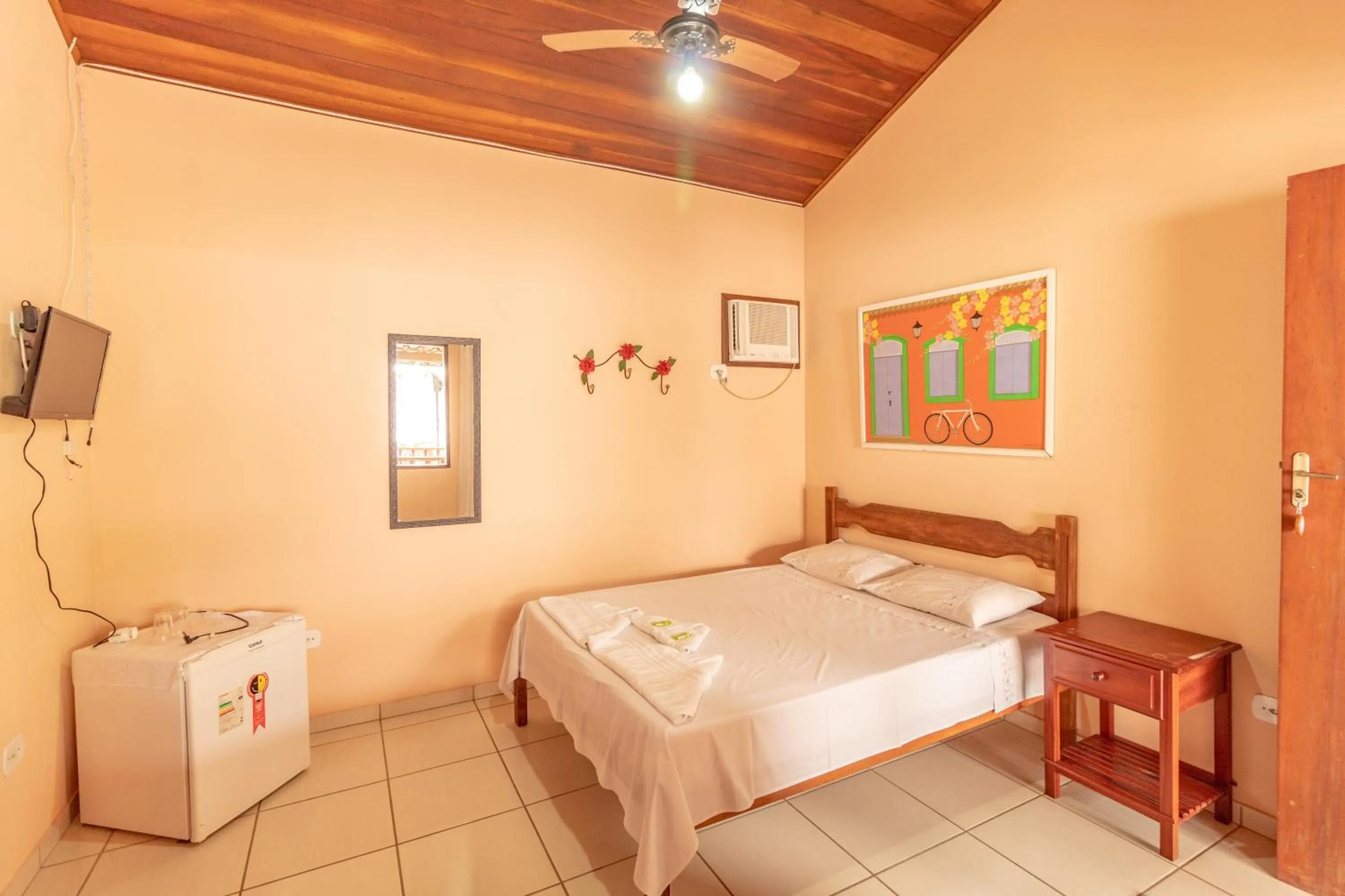 Bed in Pousada Luz do Sol