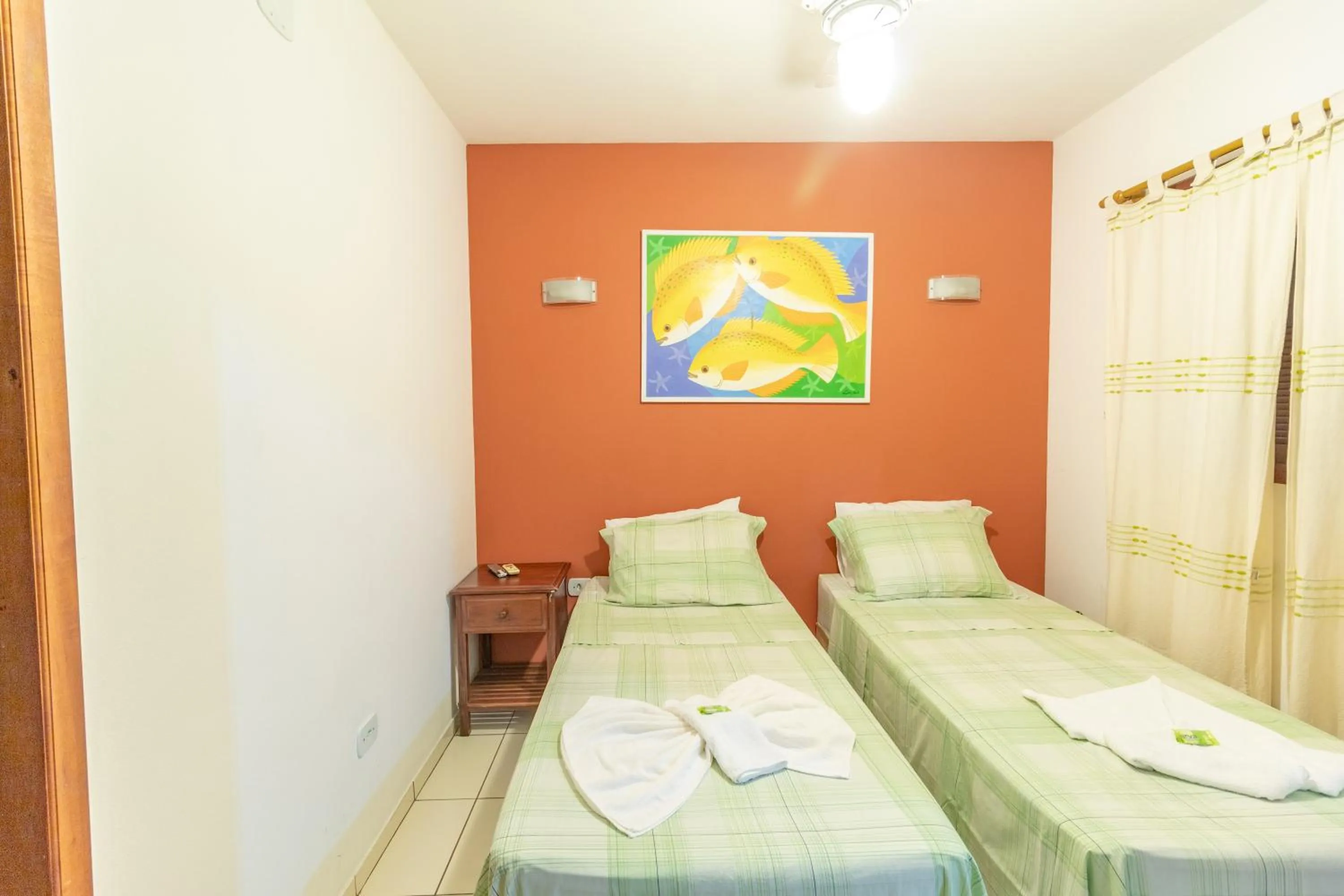 Bed in Pousada Luz do Sol