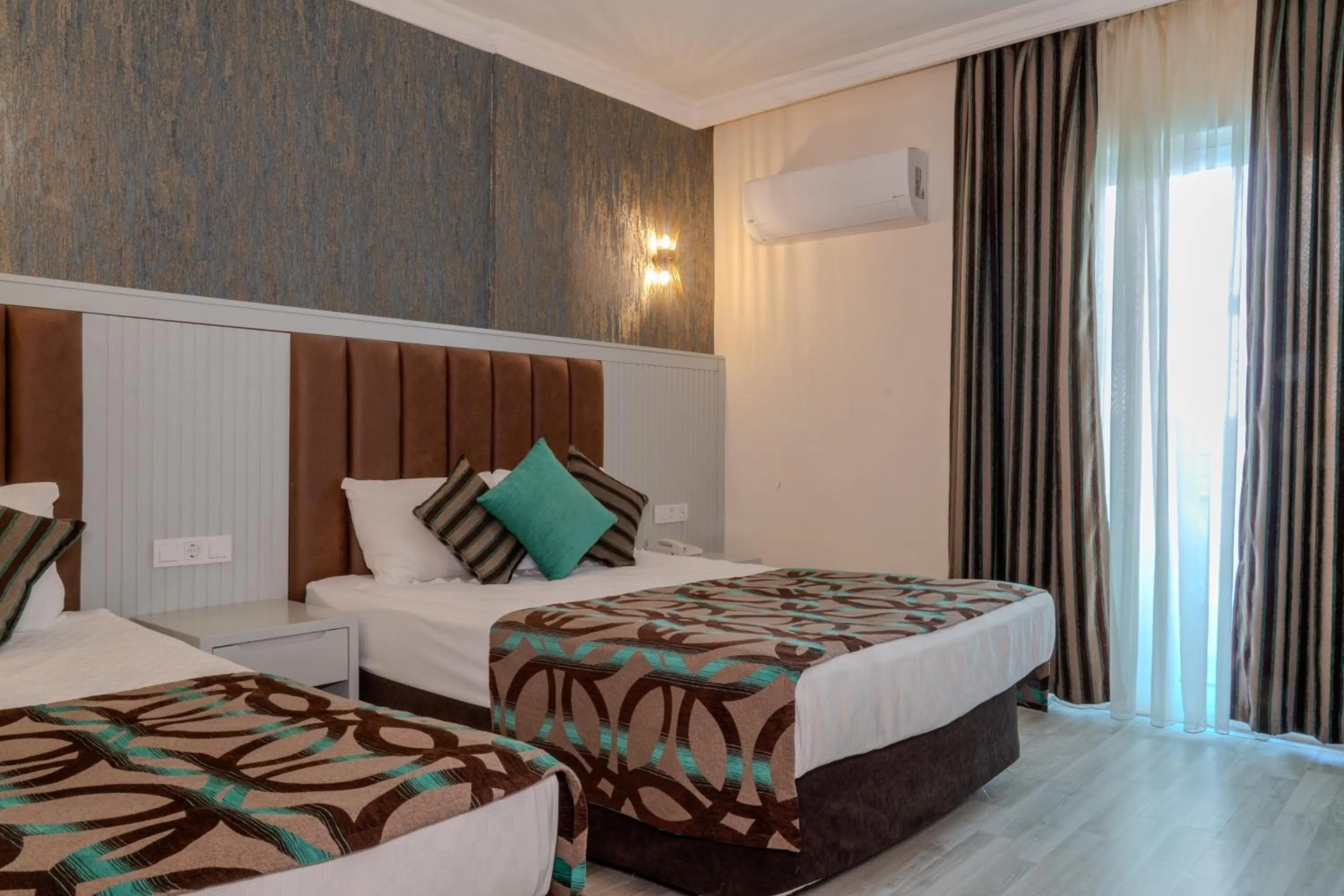 Bed in Concordia Celes Beach Hotel