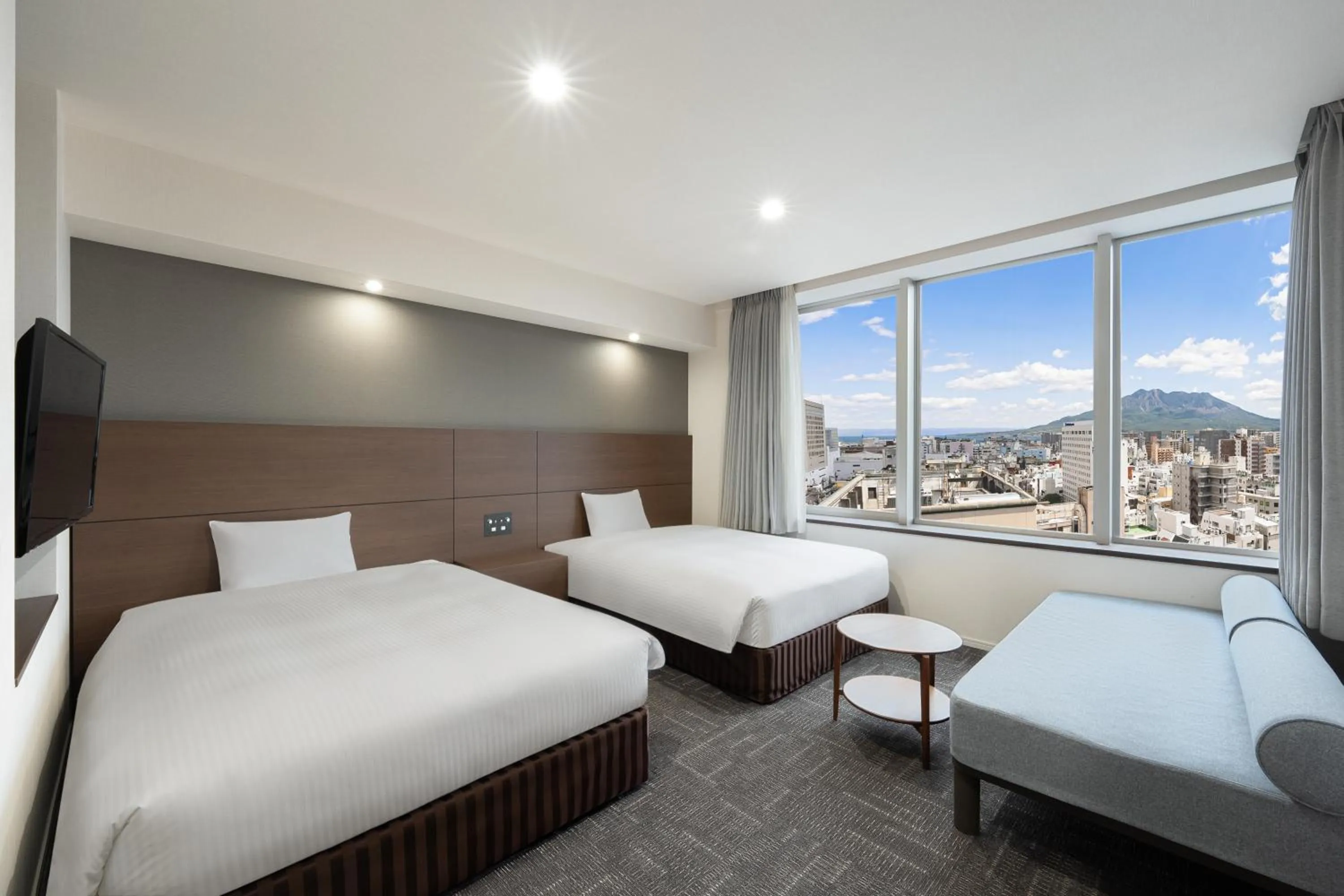 Bed in Hotel Oriental Express Kagoshima Tenmonkan