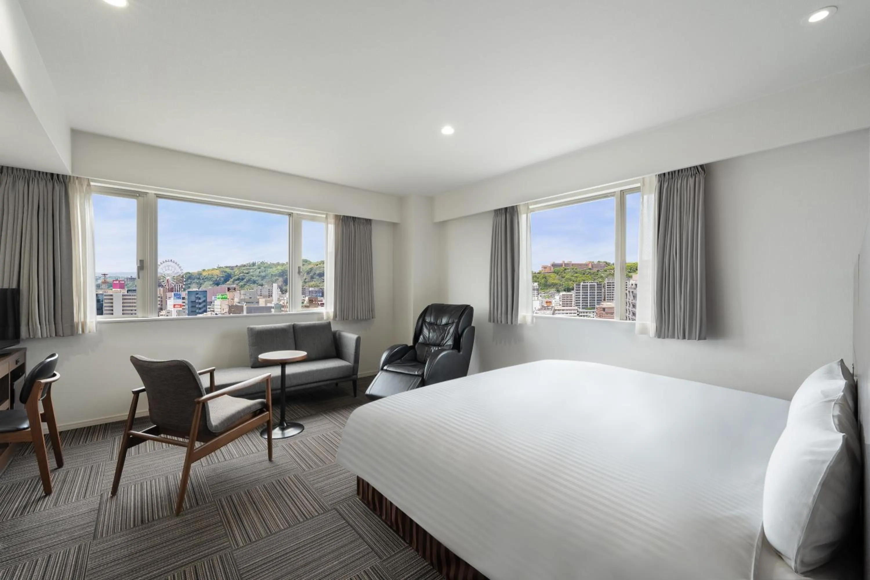 Bed in Hotel Oriental Express Kagoshima Tenmonkan