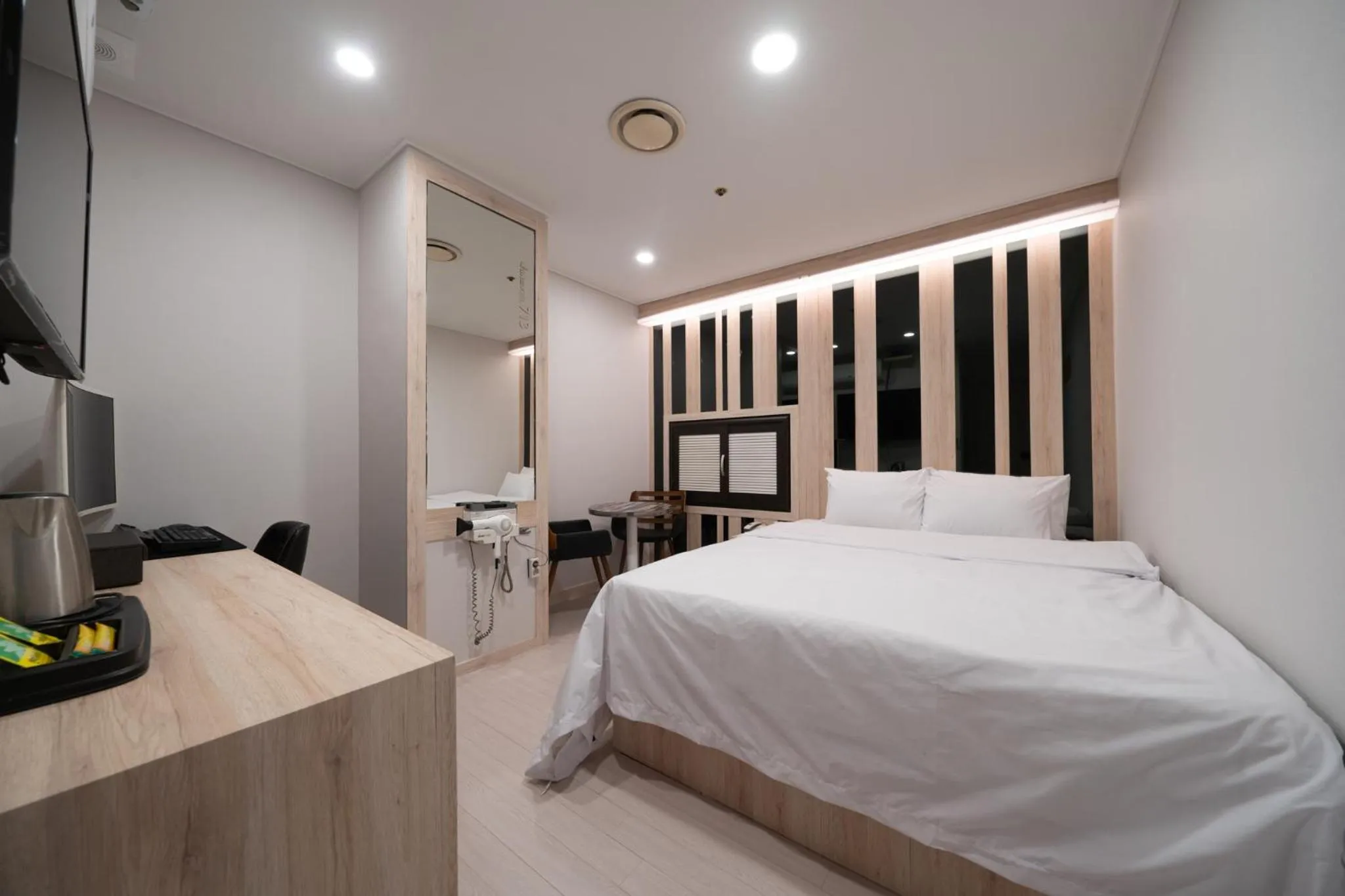 Decorative detail, Bed in Hwajeong Jun Hotel