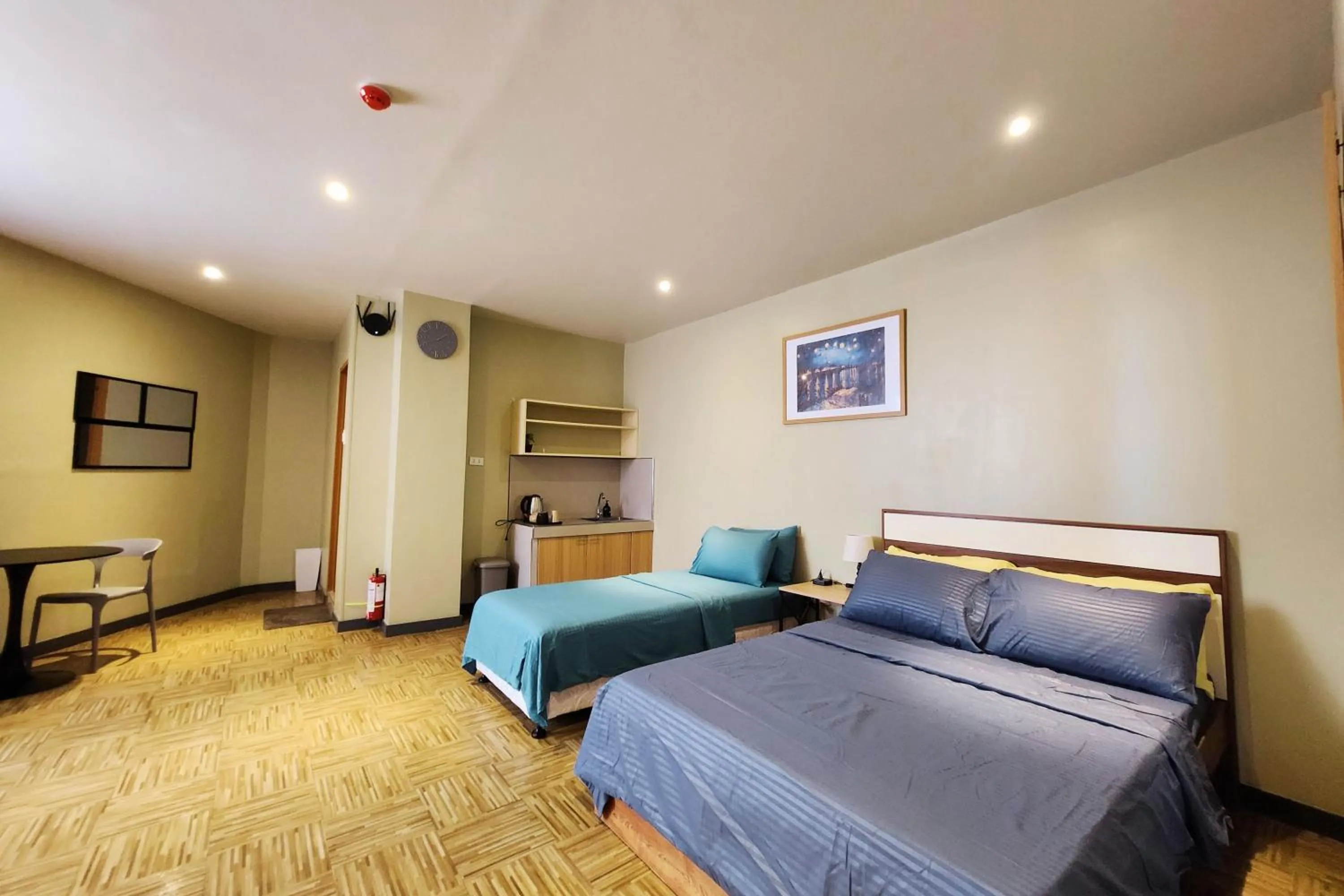 Bed in Freddo Studio Apartelle