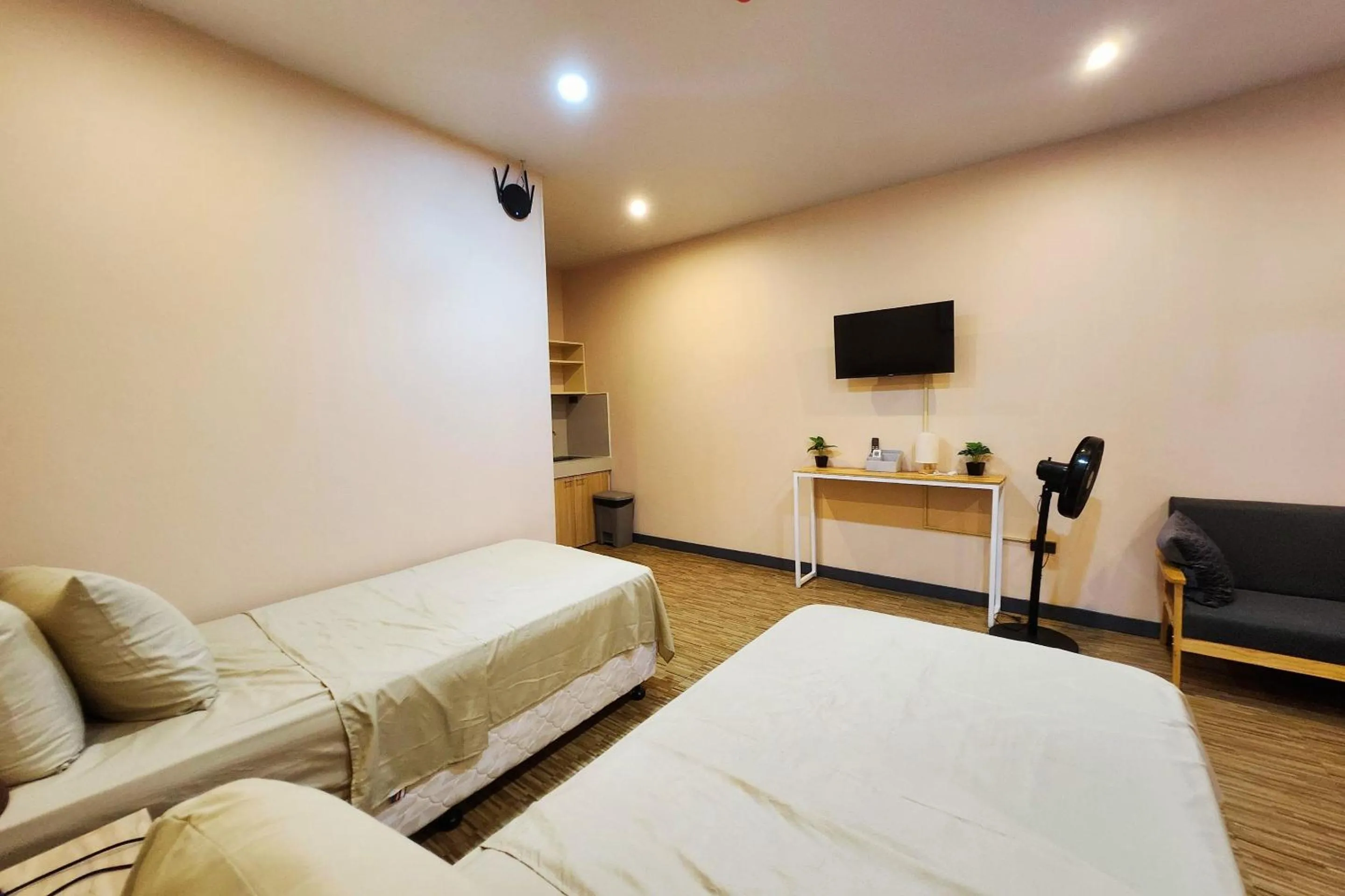 Bed in Freddo Studio Apartelle