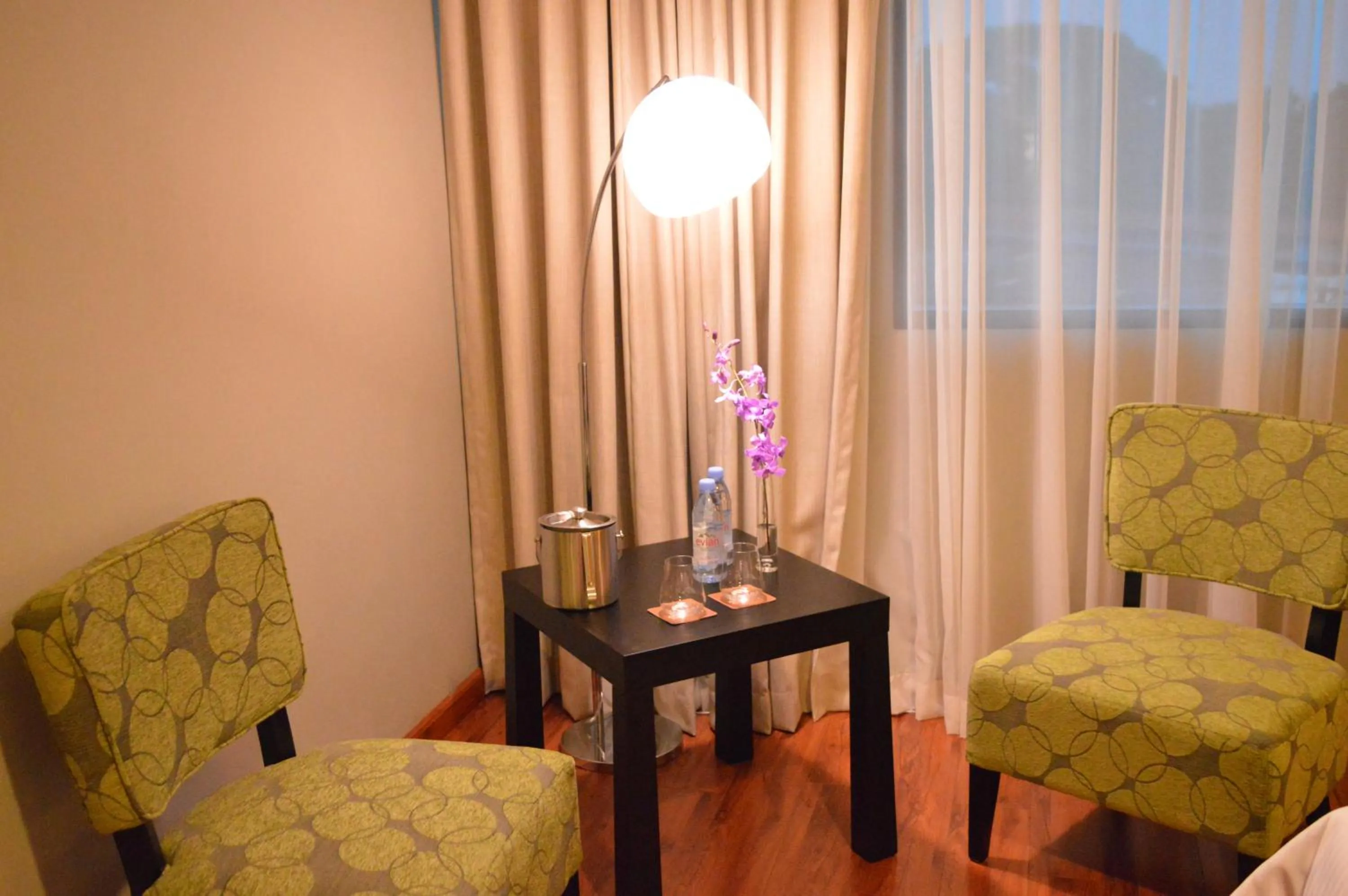 Seating area in Aranjuez Hotel & Suites
