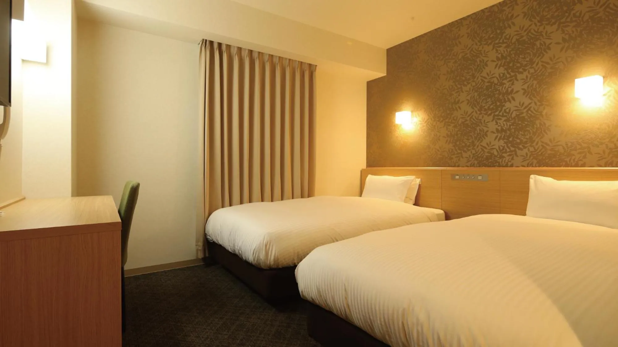 Bed in AB Hotel Sakaihigashi