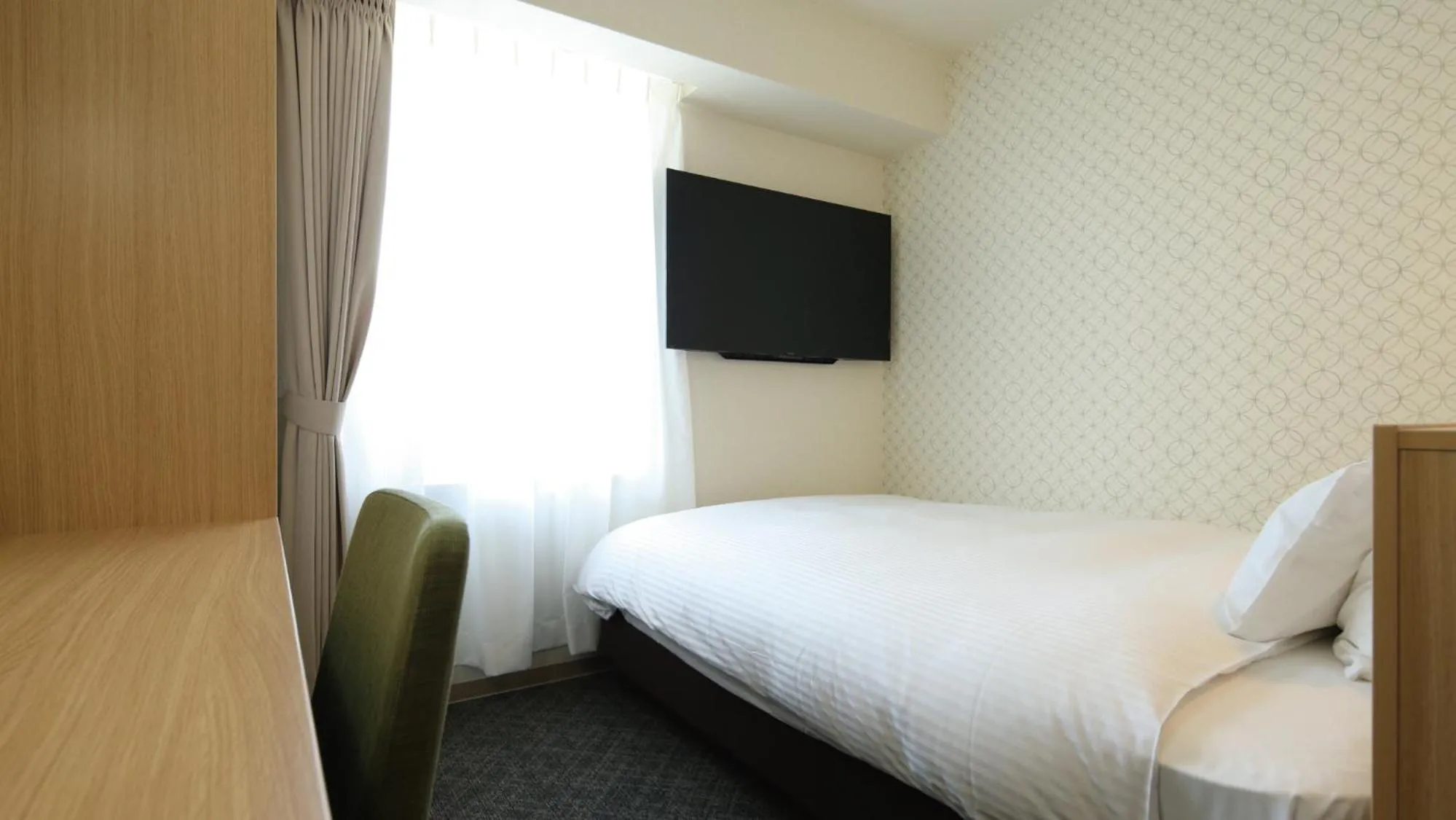 Bed in AB Hotel Sakaihigashi