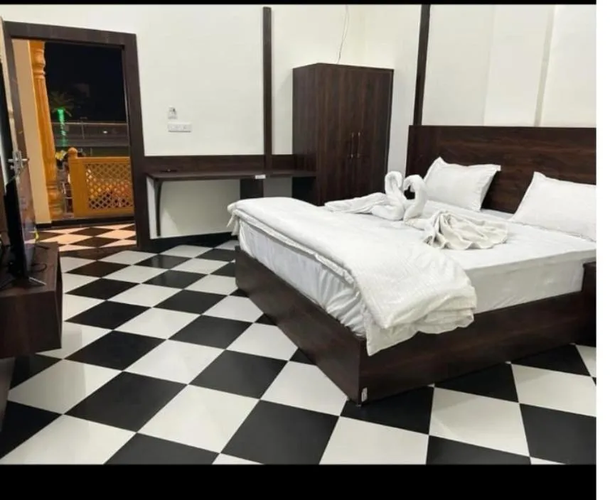 Bed in DHANWA RESORT, A UNIT OF SATKAR HOTEL AND RESORTs