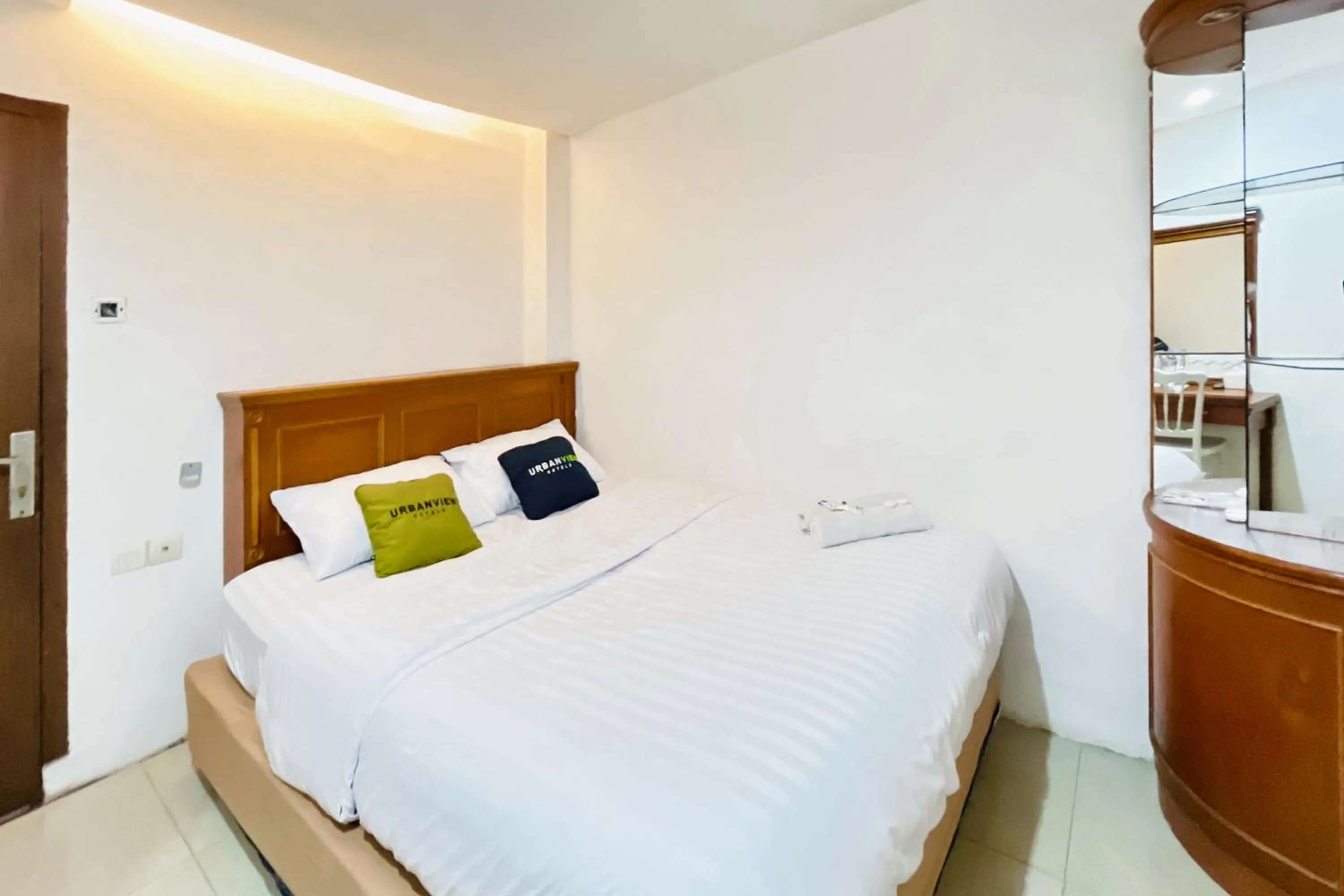 Bedroom, Bed in Urbanview Hotel Grand Mohaga Medan