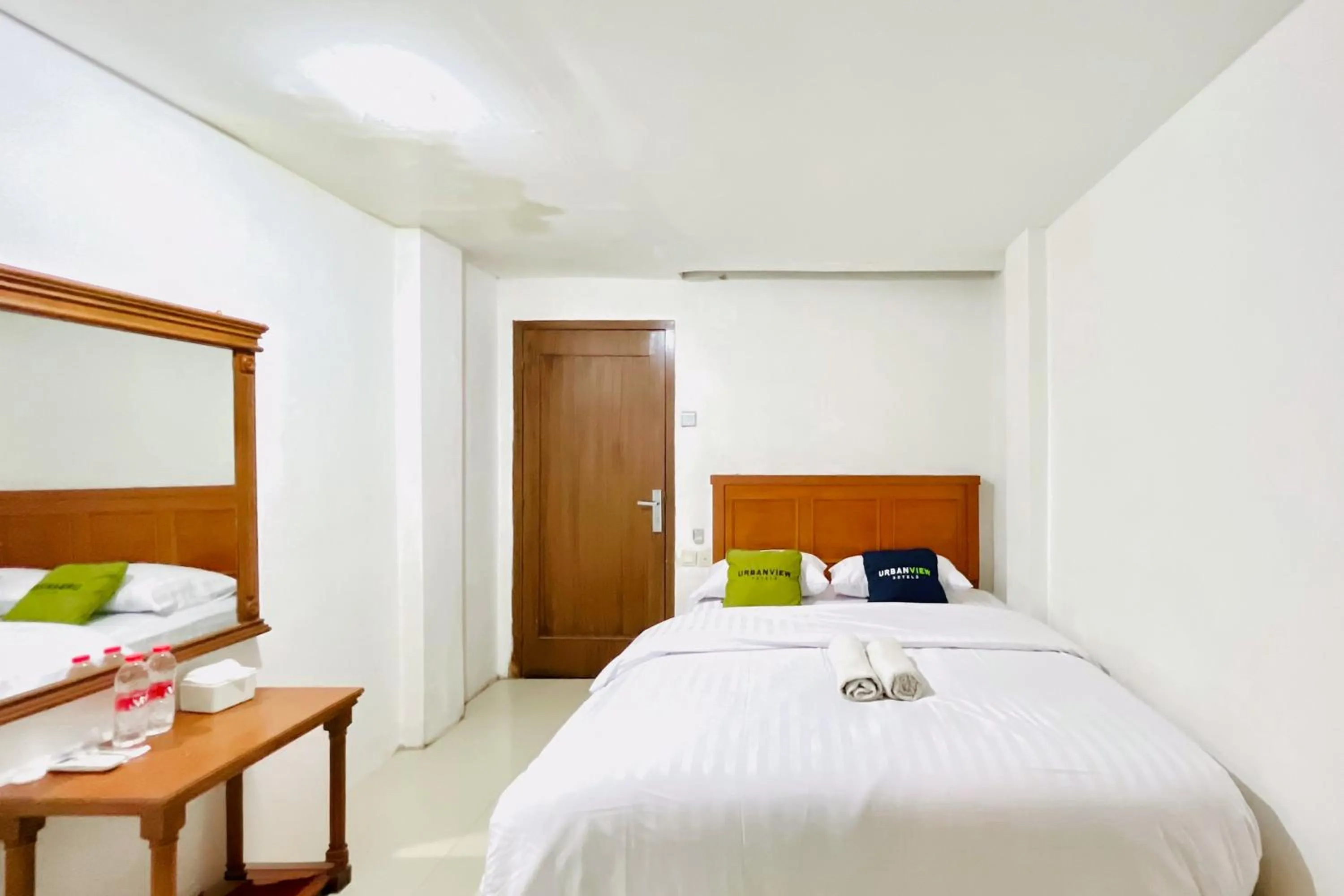 Bedroom, Bed in Urbanview Hotel Grand Mohaga Medan