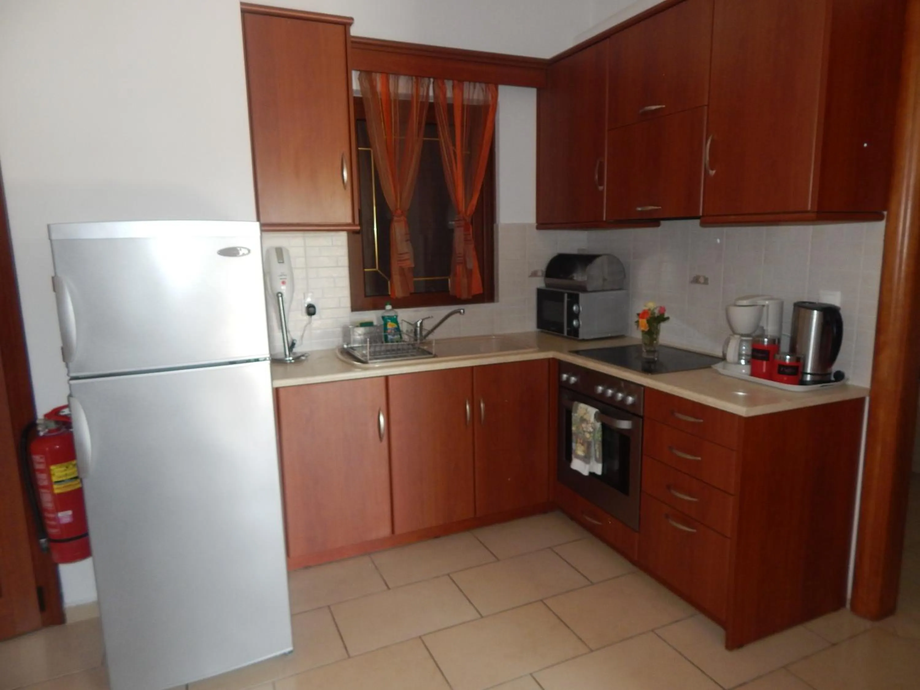 Kitchen or kitchenette in Kalloni village apartments