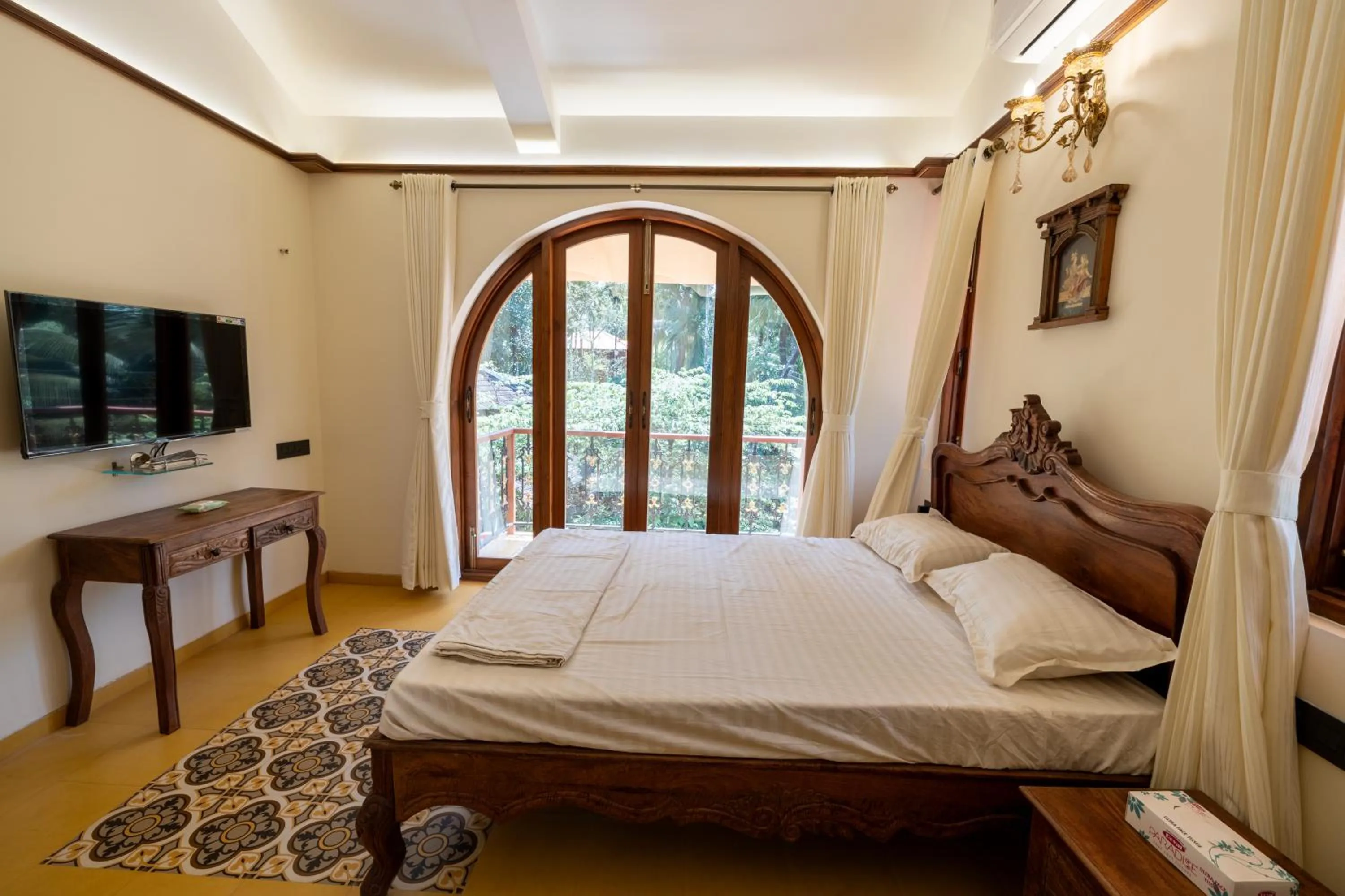 Bed in Ishaan Holiday Home