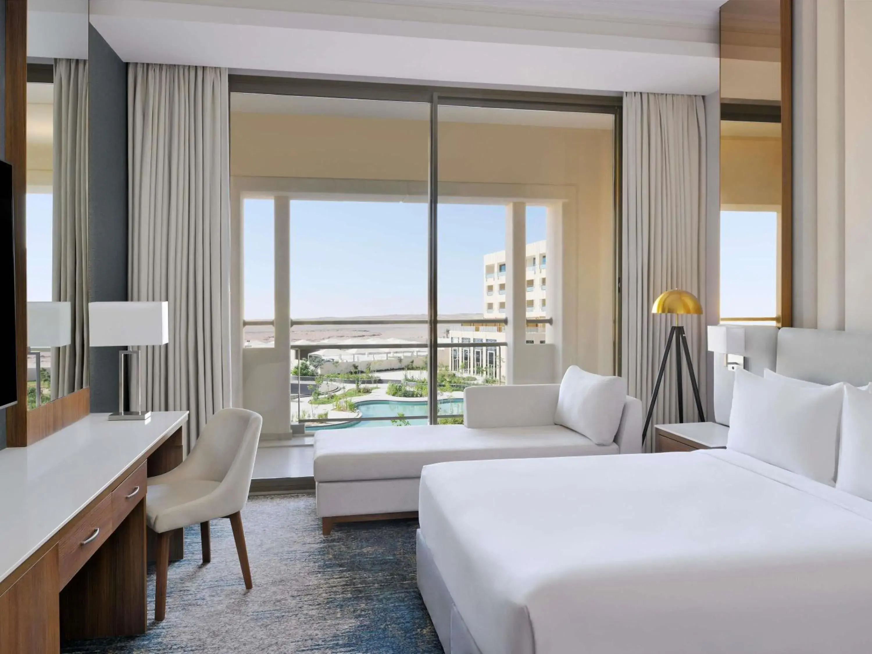 Deluxe Queen Room with Pool View in Mövenpick Hotel Waad Al Shamal Deluxe Queen Room with Pool View in Mövenpick Hotel Waad Al Shamal