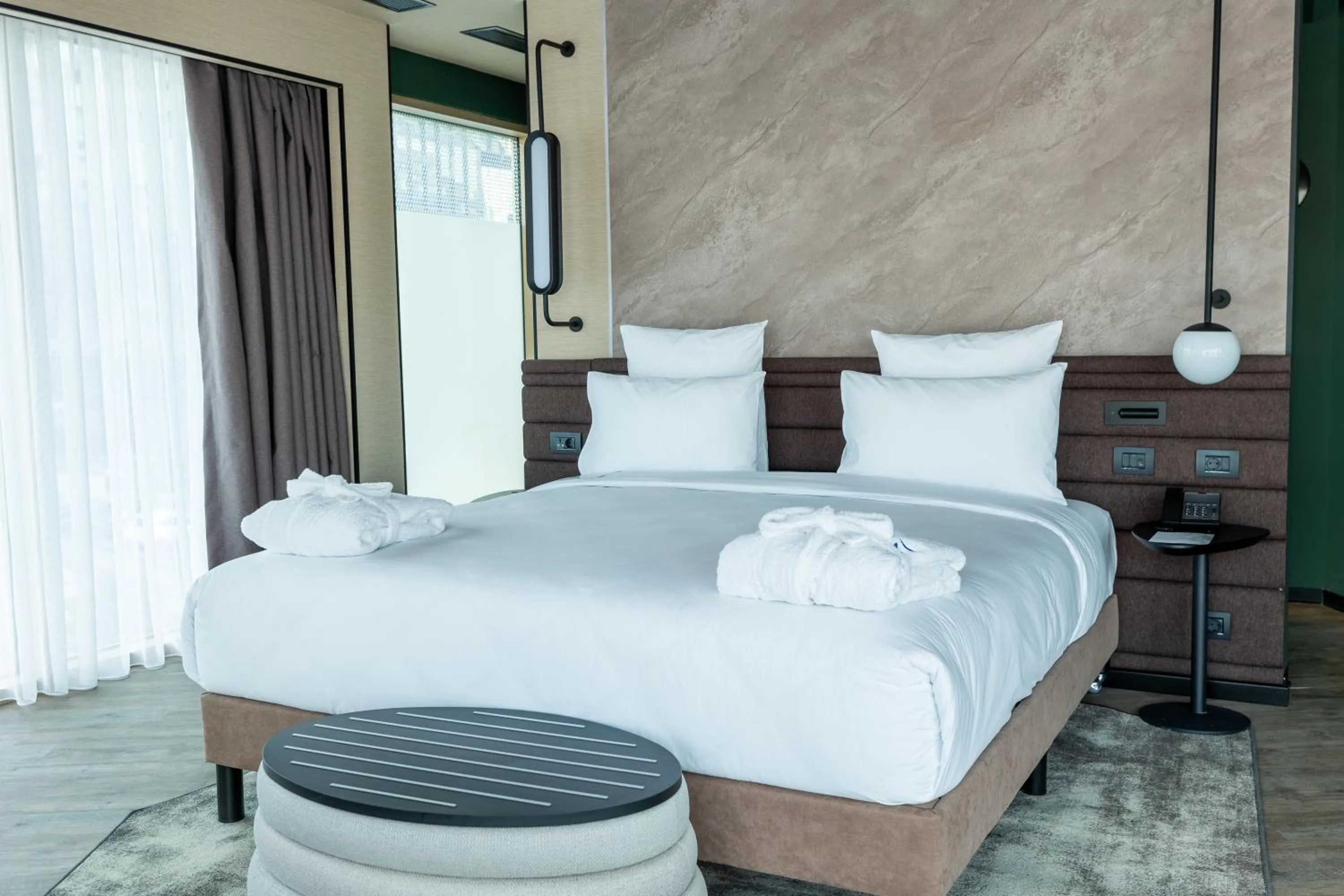 Bed in Novotel Istanbul Bomonti