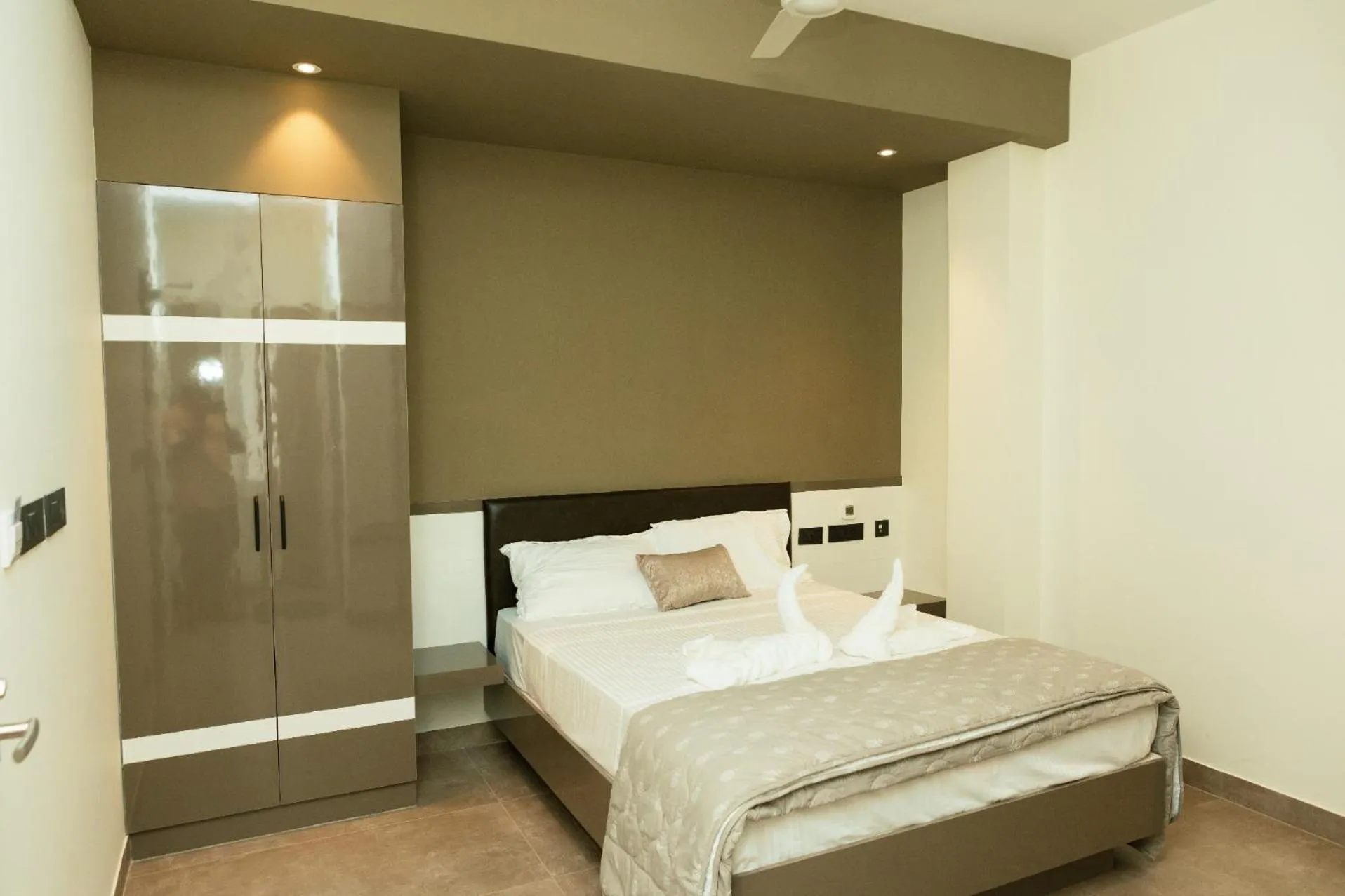 Photo of the whole room, Bed in MAS Residency