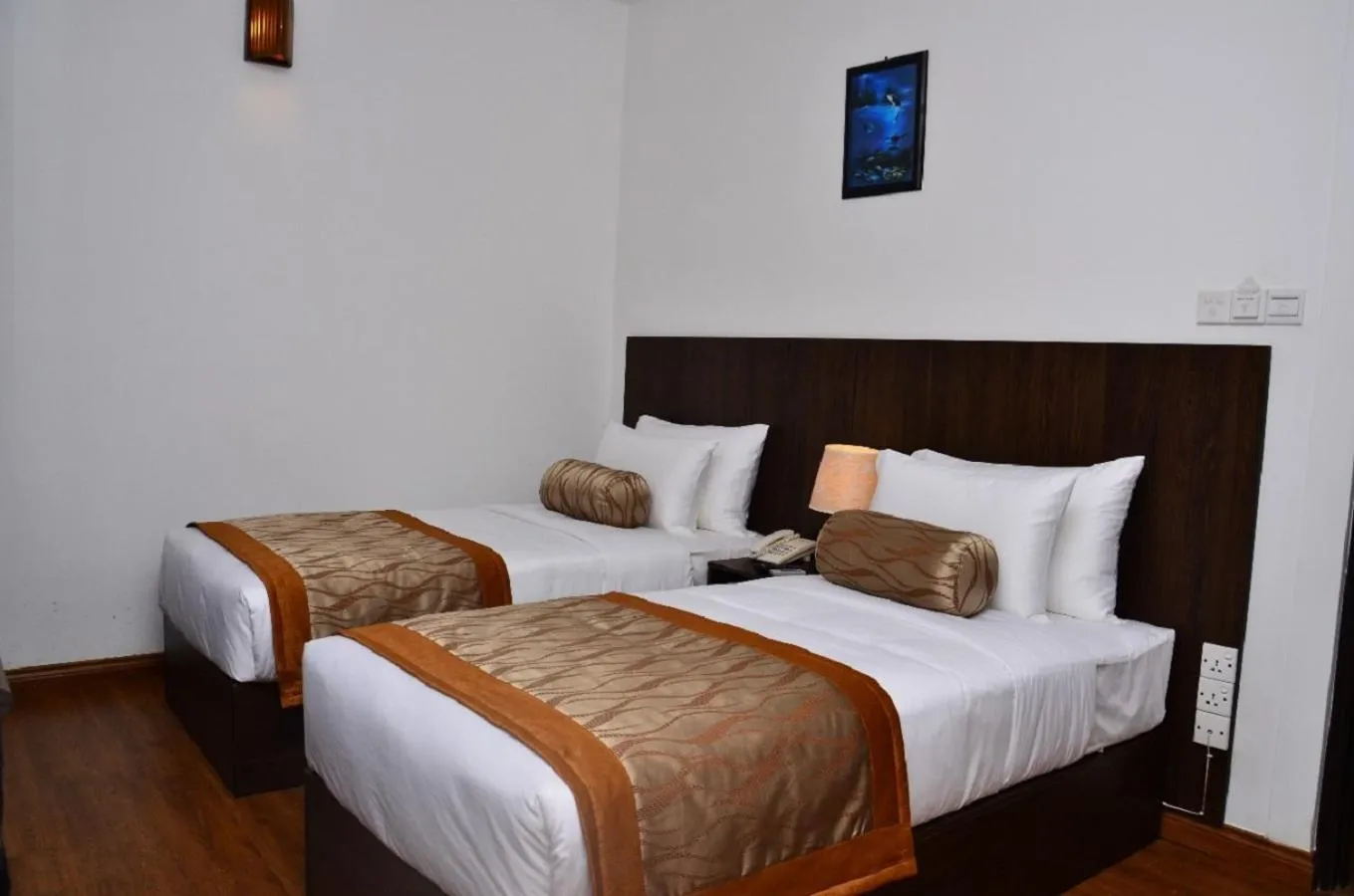 Bed in Nat City Hotel