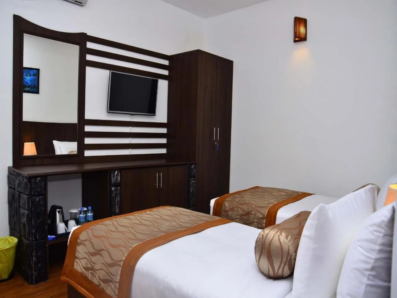 Bed in Nat City Hotel