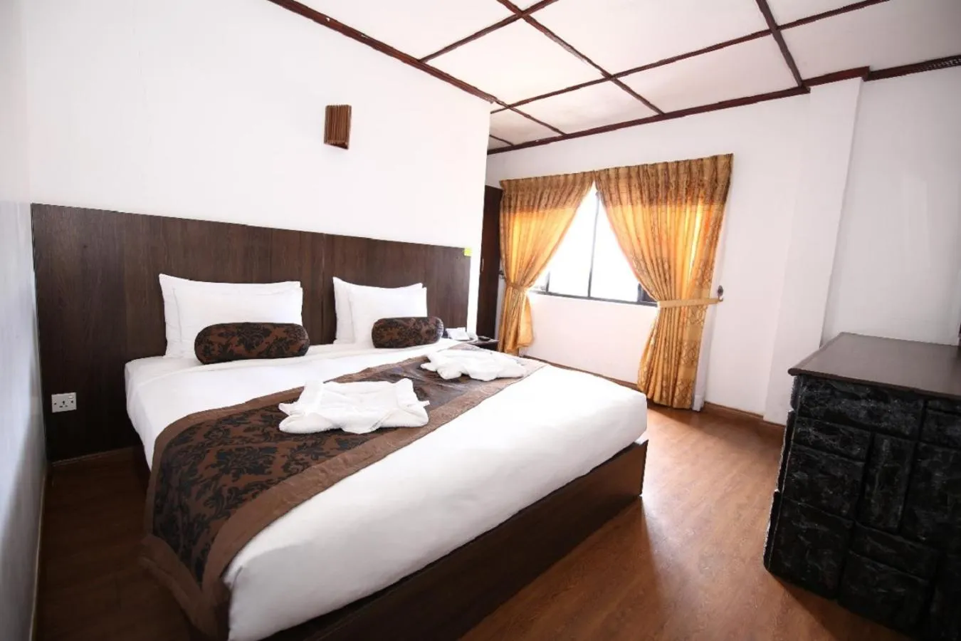 Photo of the whole room, Bed in Nat City Hotel