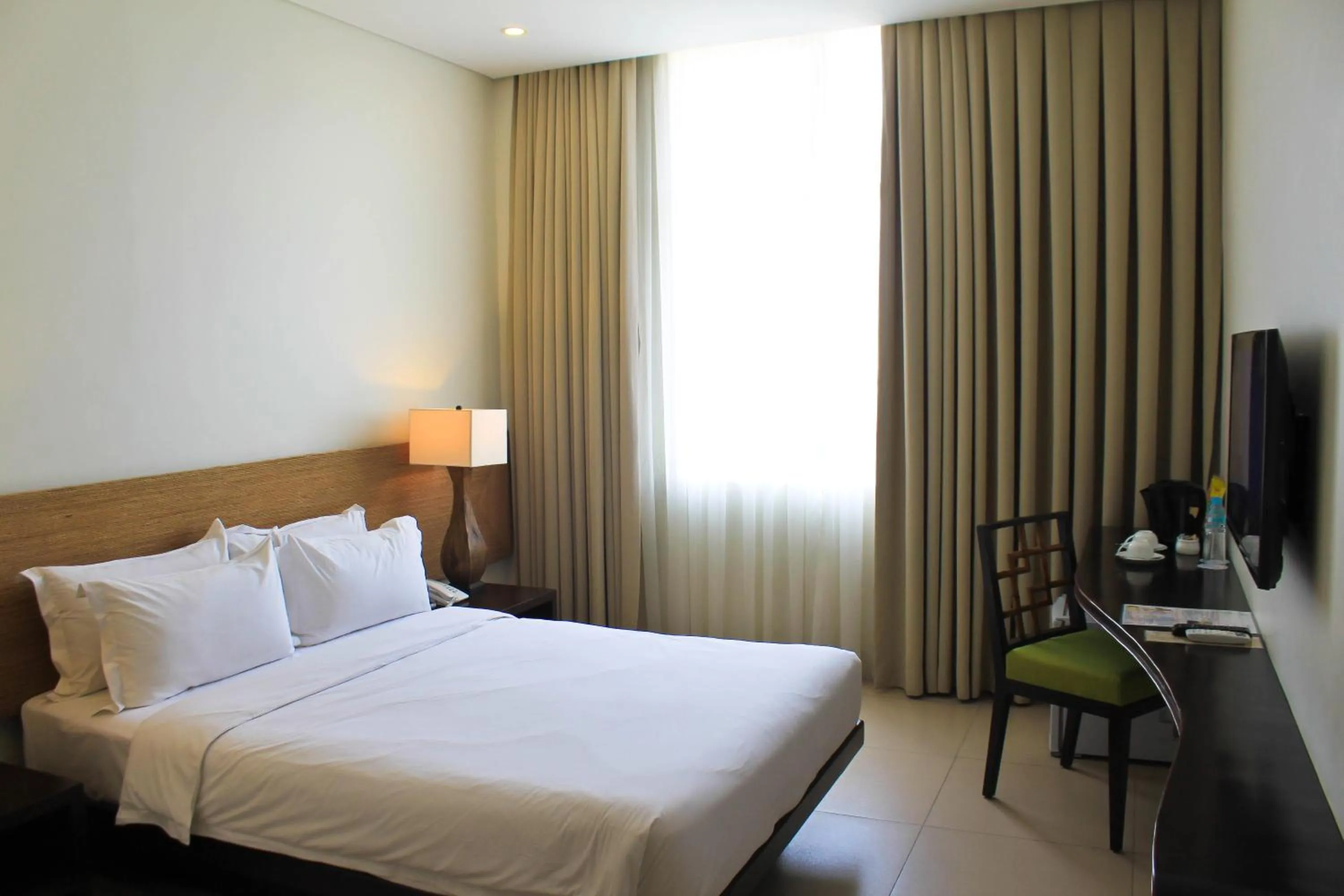 Bed in Azia Suites and Residences