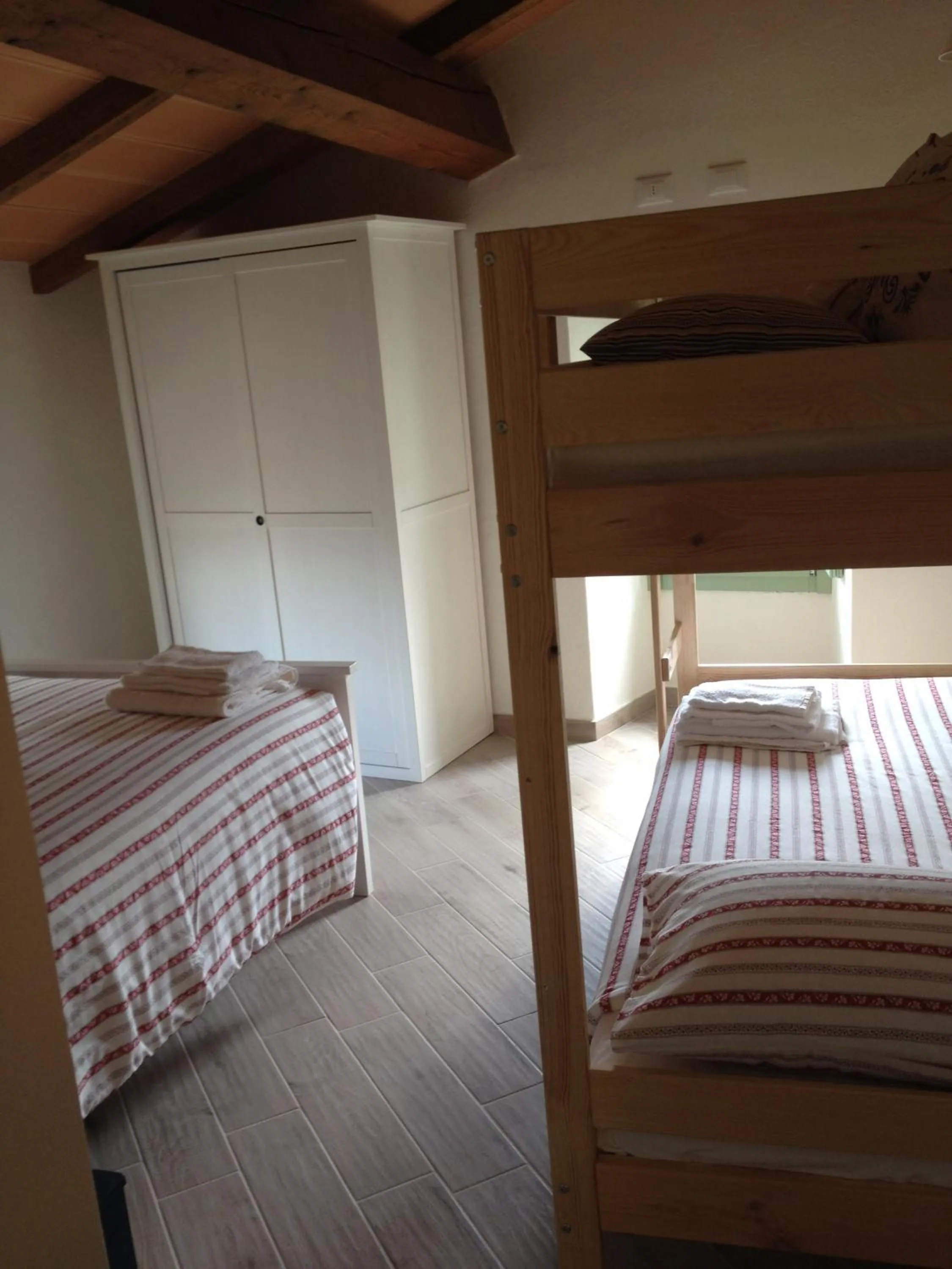 Photo of the whole room, Bed in La Corte del Borgo