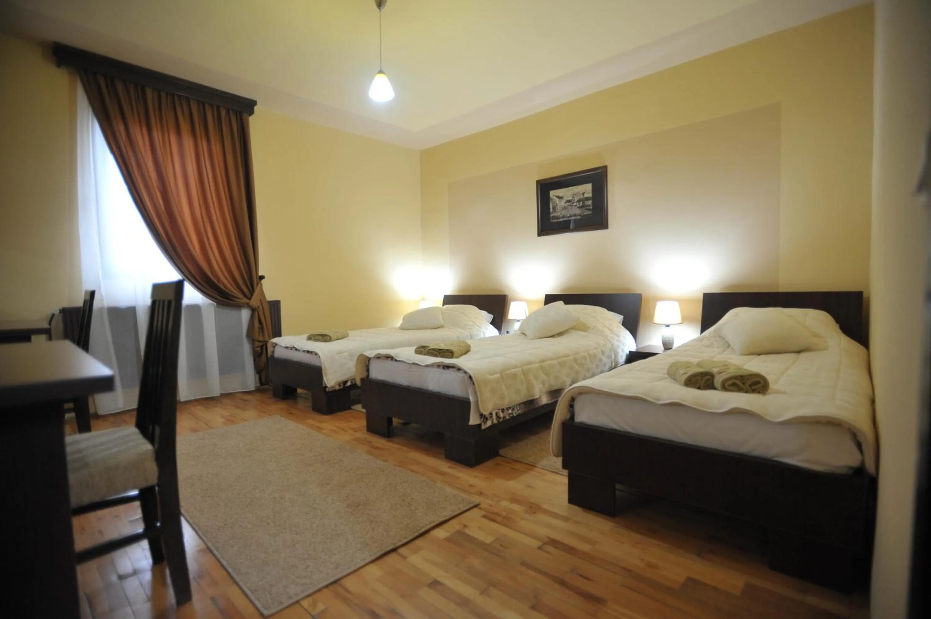 Bed in Garni Hotel City