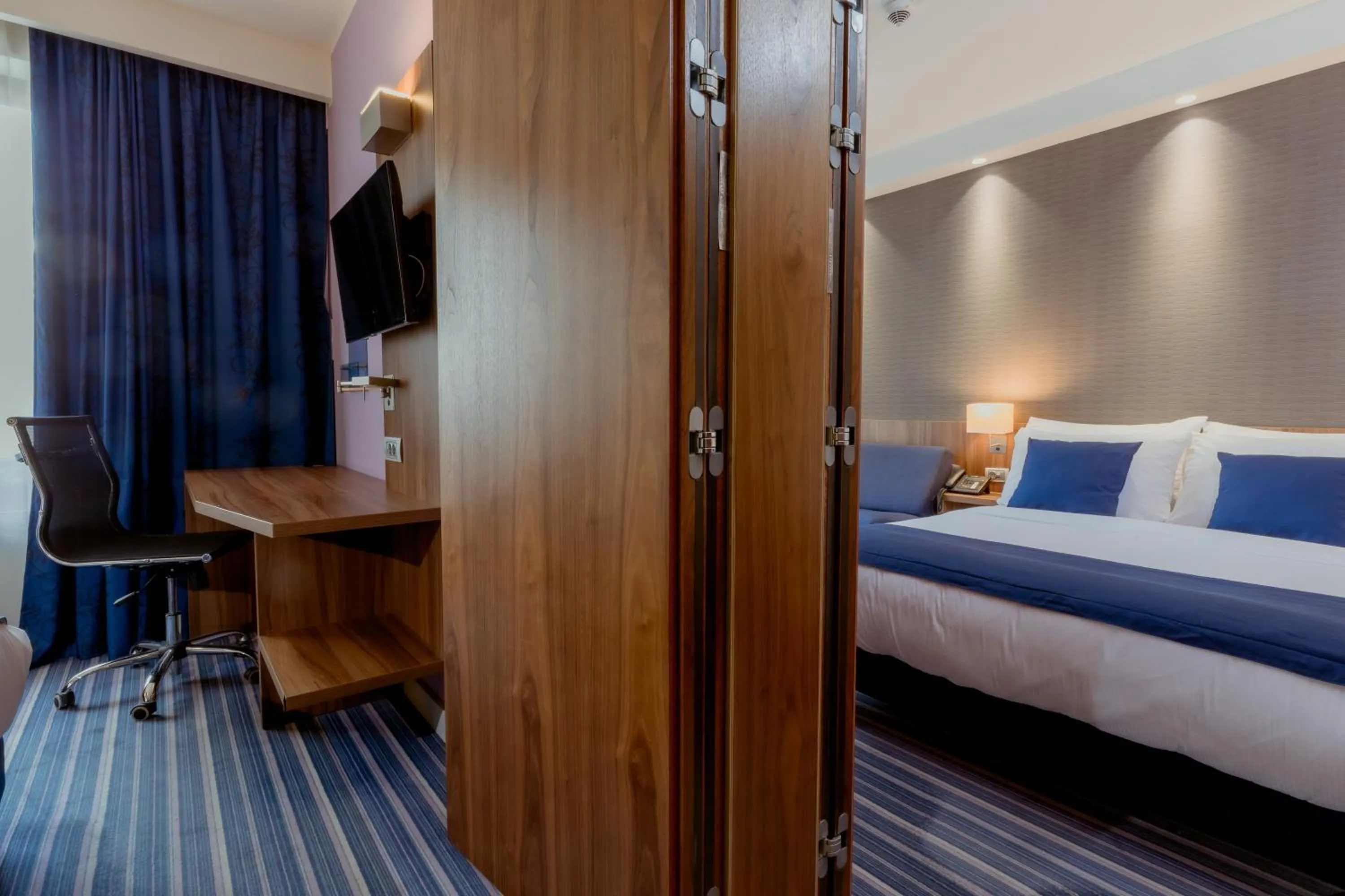 Bed in Nobel Palace Hotel