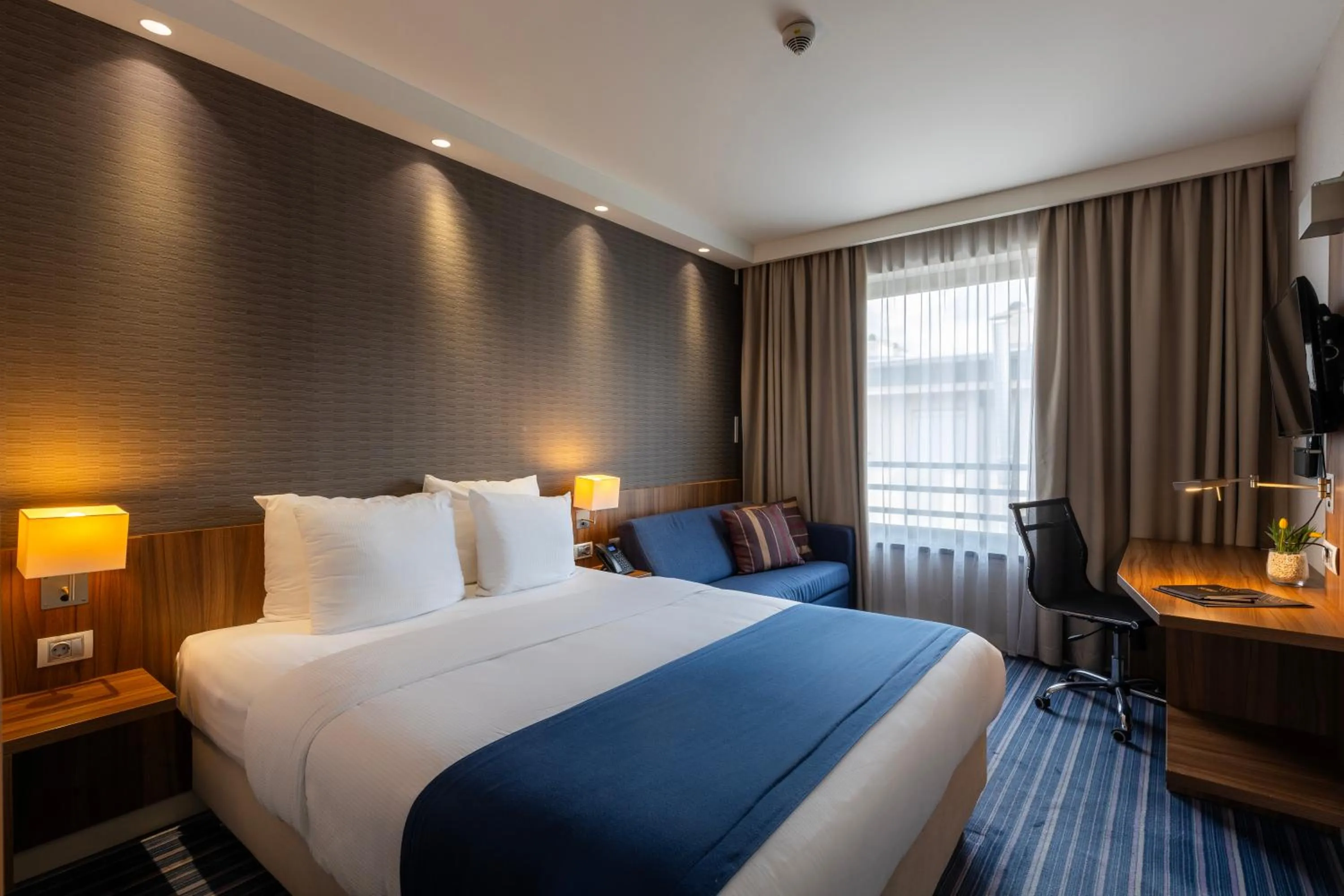 Bed in Nobel Palace Hotel