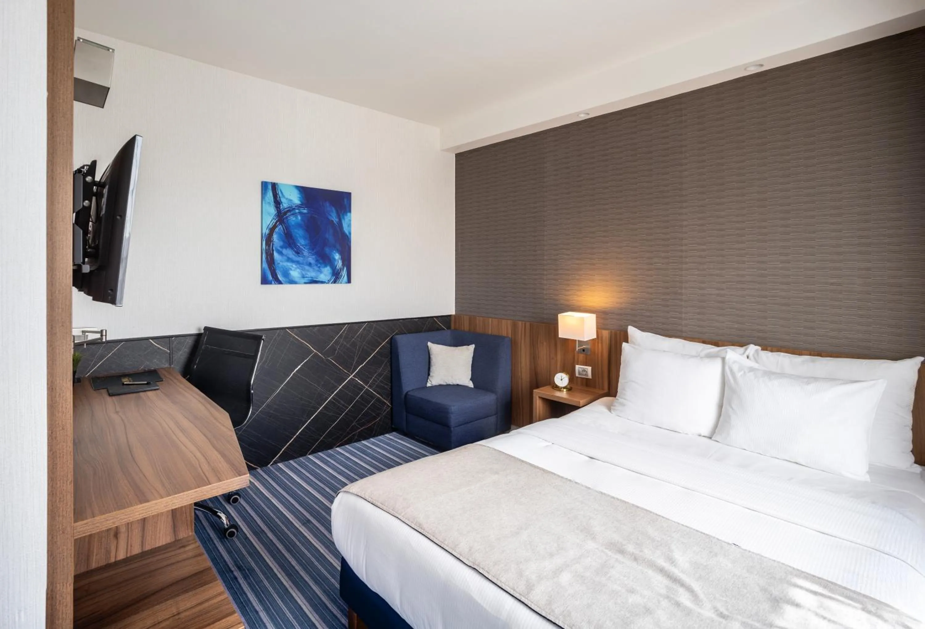 Bed in Nobel Palace Hotel