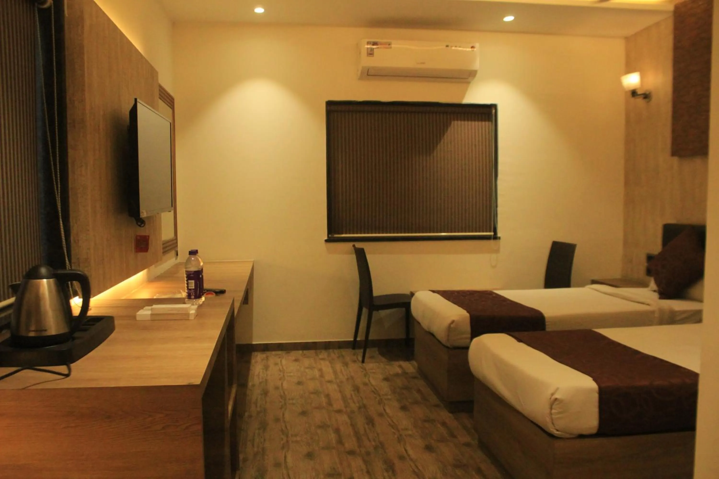 Bed in Hotel Sahyadri