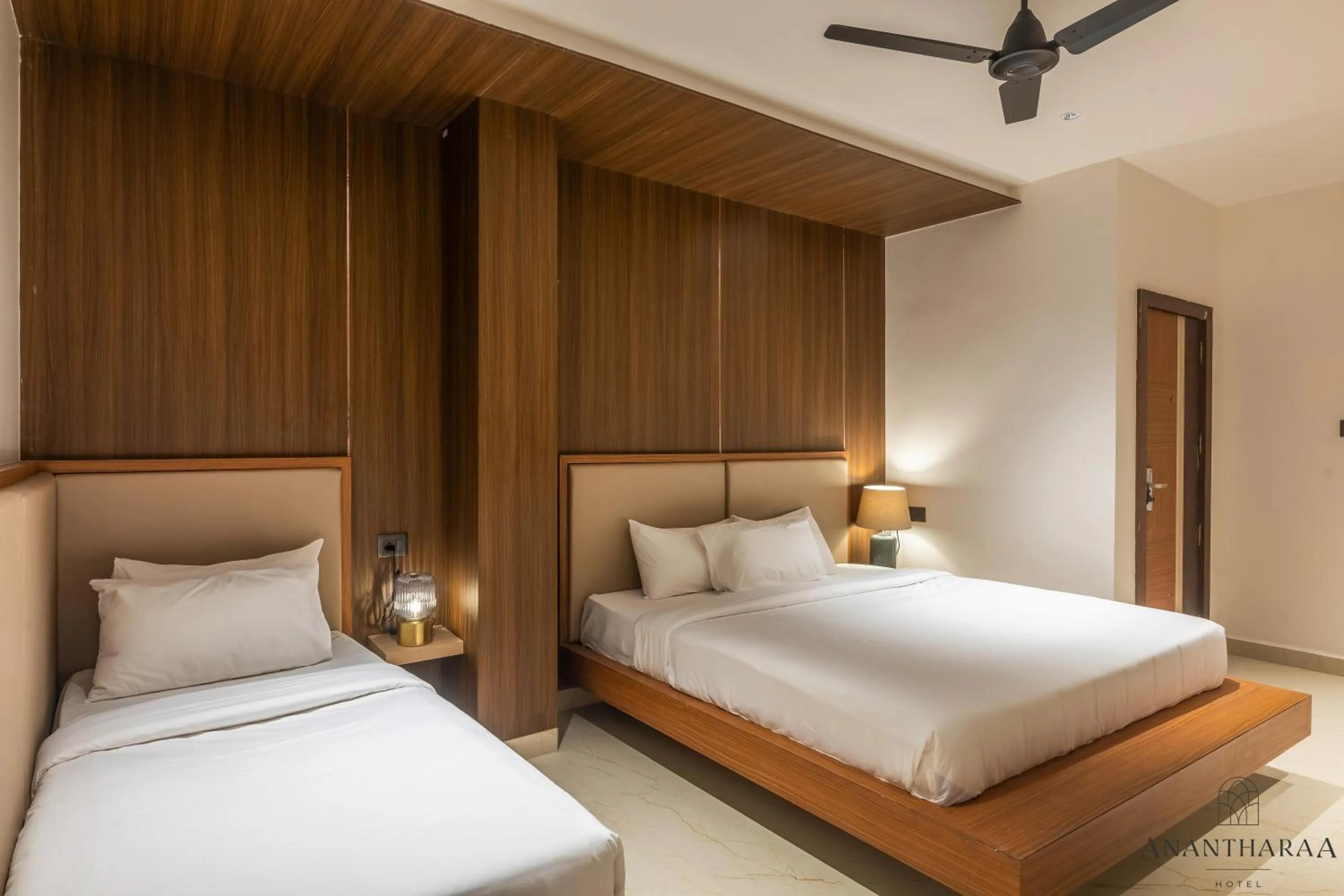 Photo of the whole room, Bed in Anantharaa Hotel