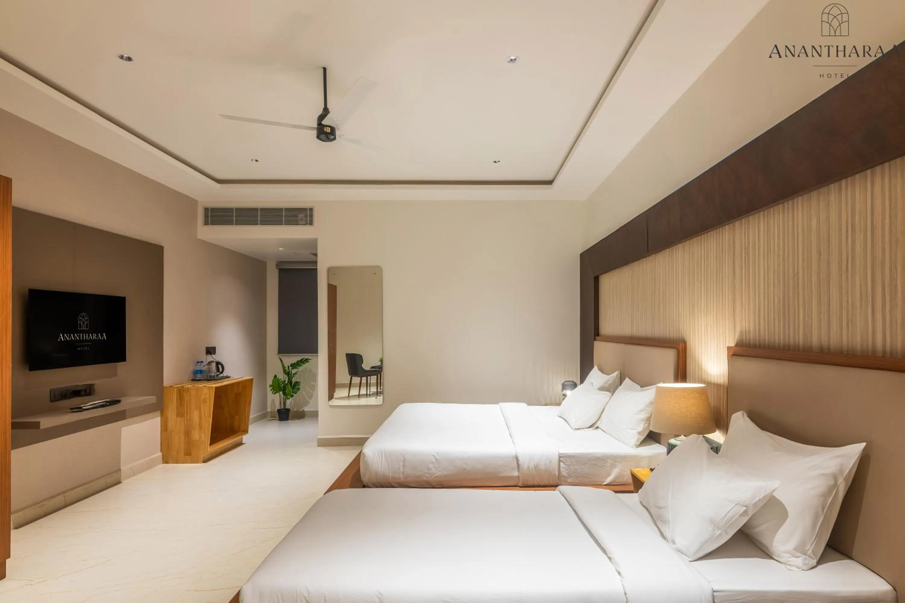 Photo of the whole room, Bed in Anantharaa Hotel