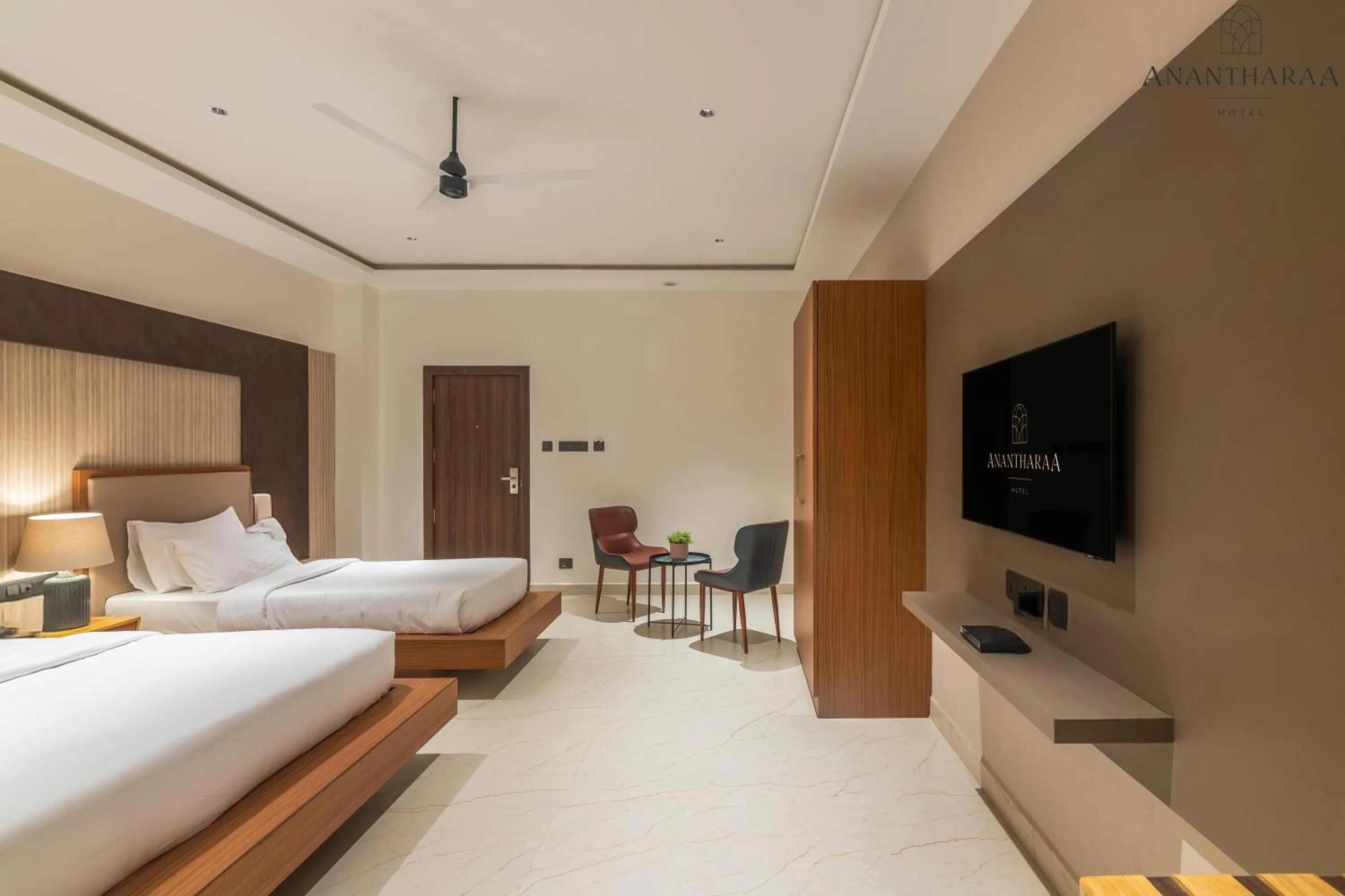 Photo of the whole room, Bed in Anantharaa Hotel