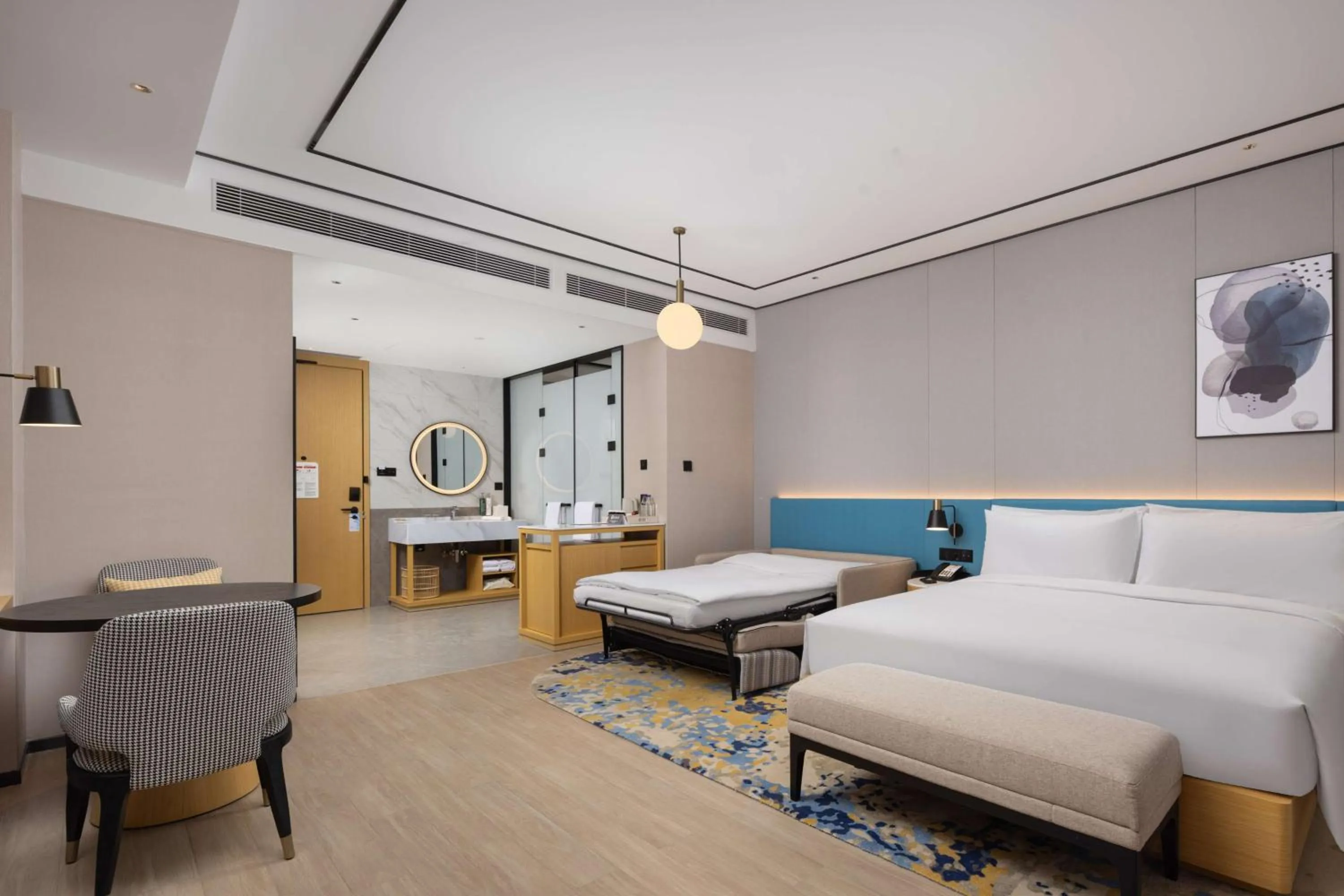 Living room, Bed in Hilton Garden Inn Zhoukou Huaiyang