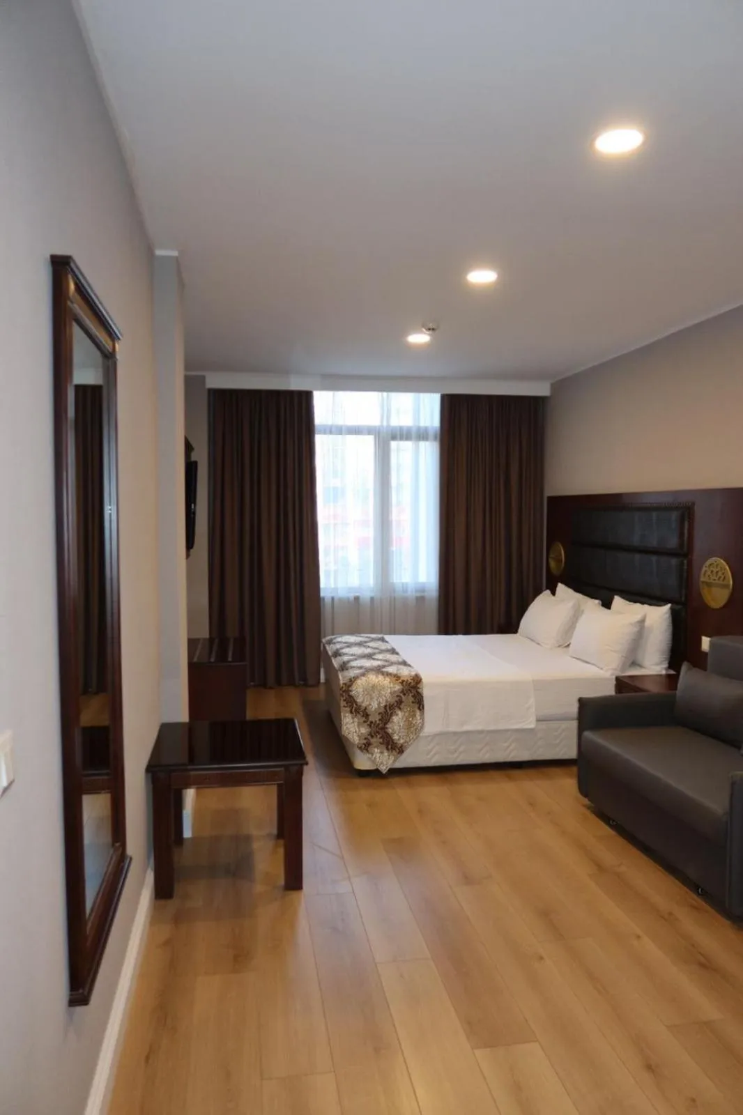 Photo of the whole room, Bed in Era Palace Batumi