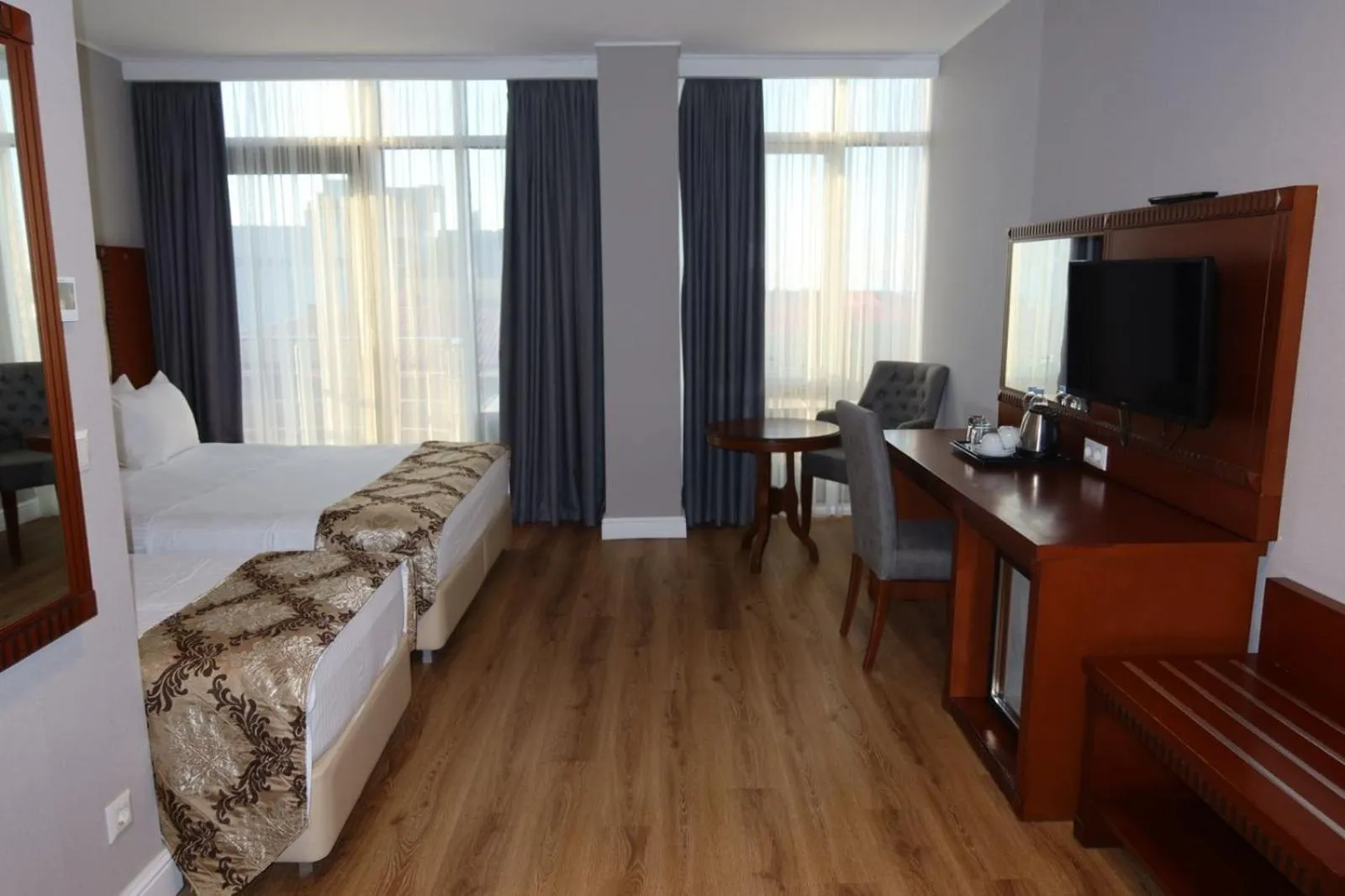 Photo of the whole room, Bed in Era Palace Batumi