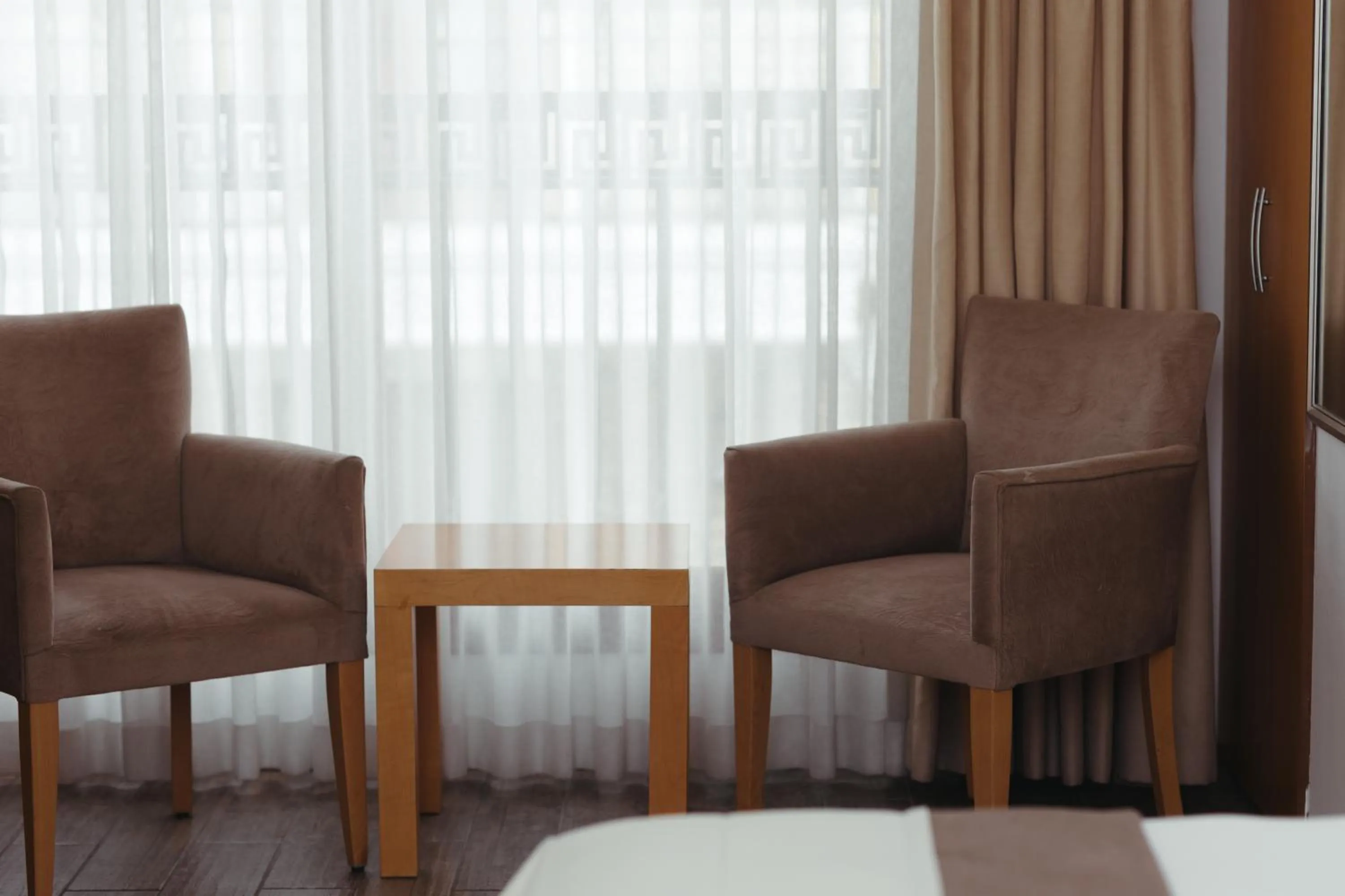 Seating area in MB City Hotel