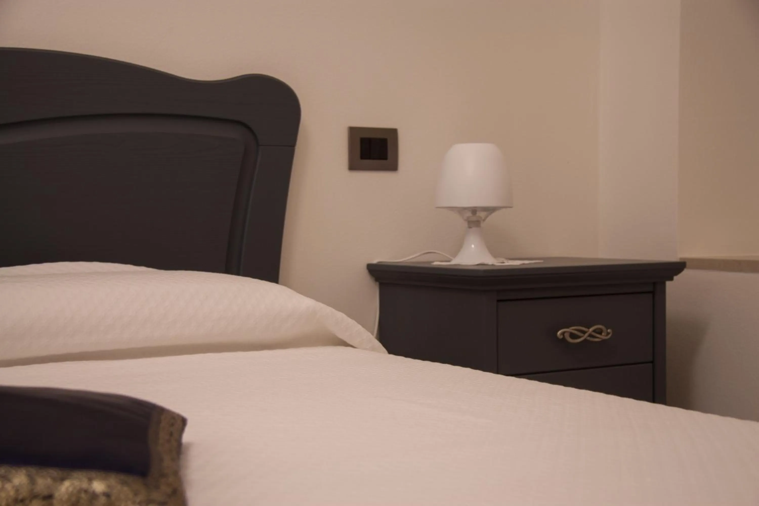 Bed in Palazzo di Primavera Guest House