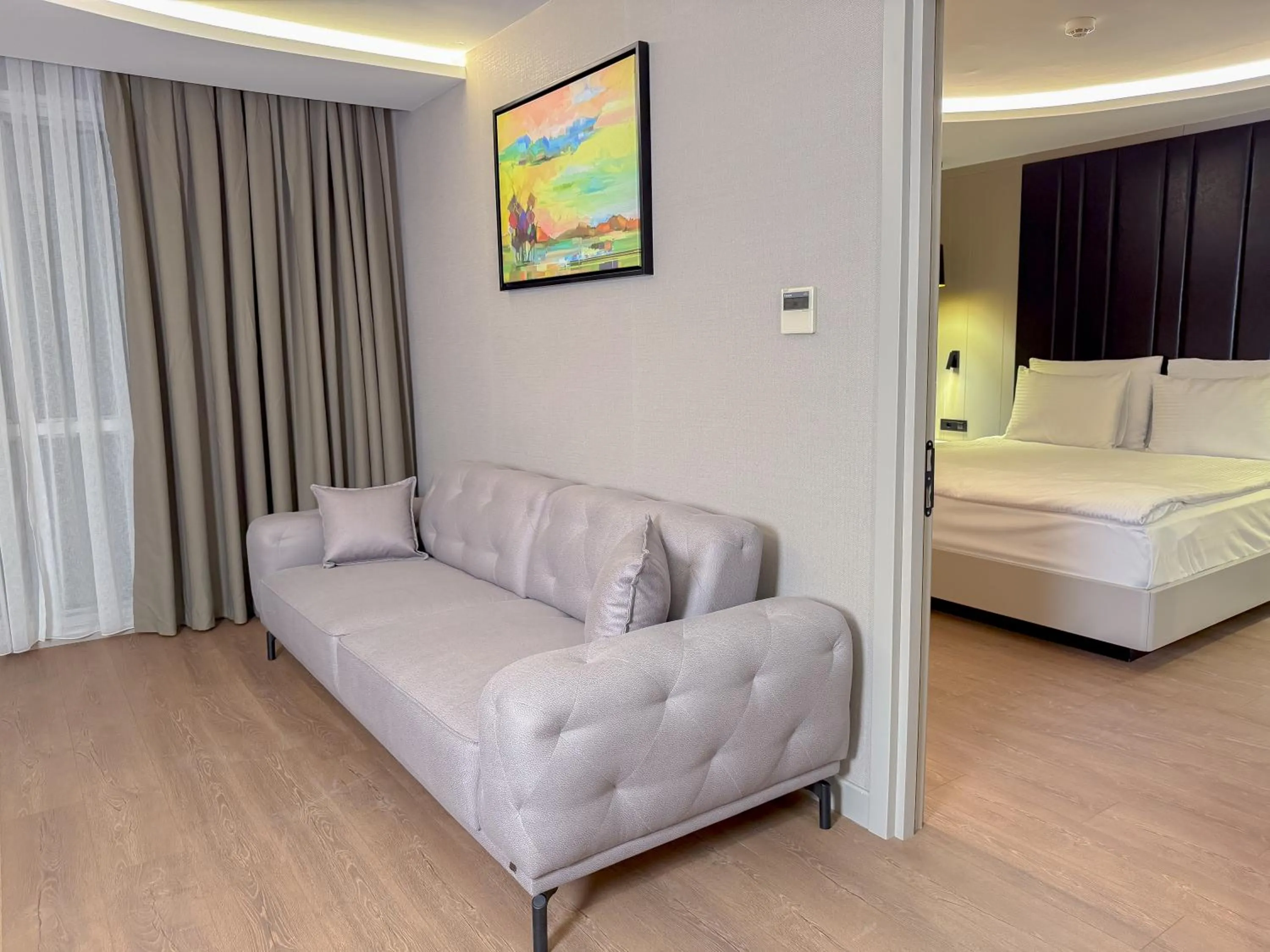 Seating area, Bed in Dedeman Adana