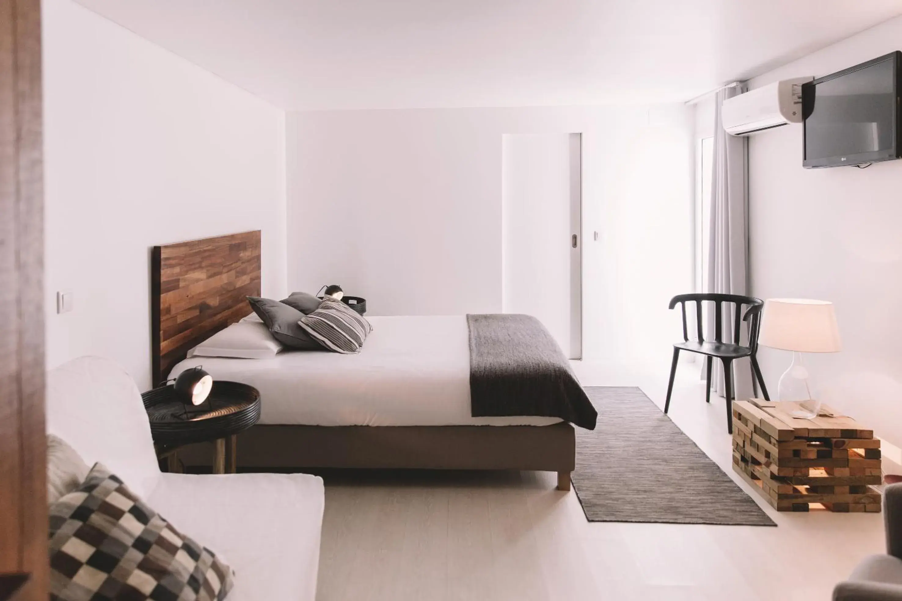 Deluxe Double Room (2 Adults + 1 Child) in Santa Bica Eat Drink & Sleep Deluxe Double Room (2 Adults + 1 Child) in Santa Bica Eat Drink & Sleep