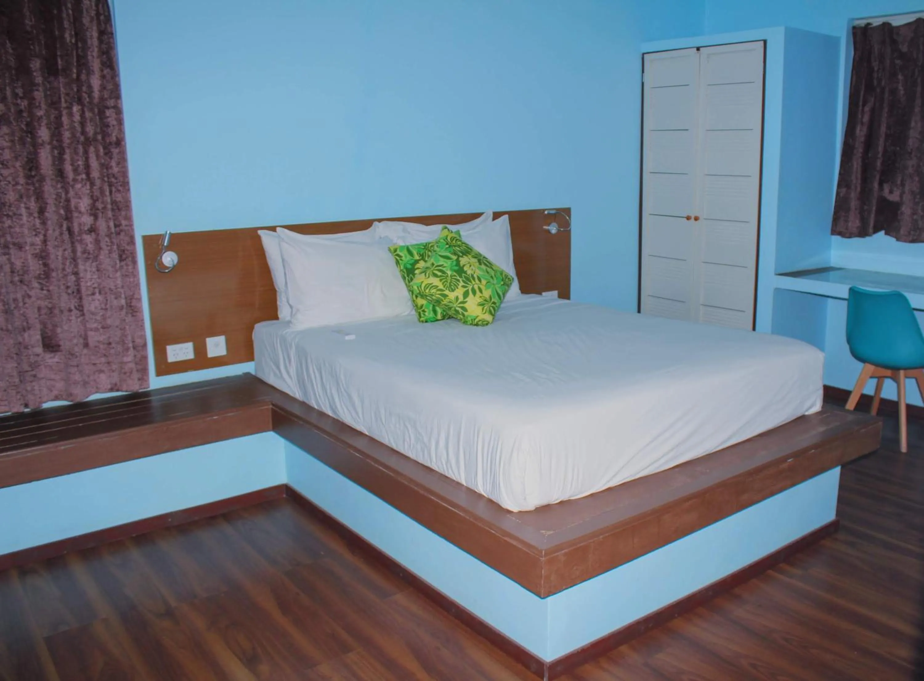 Bed in Blue West Villas