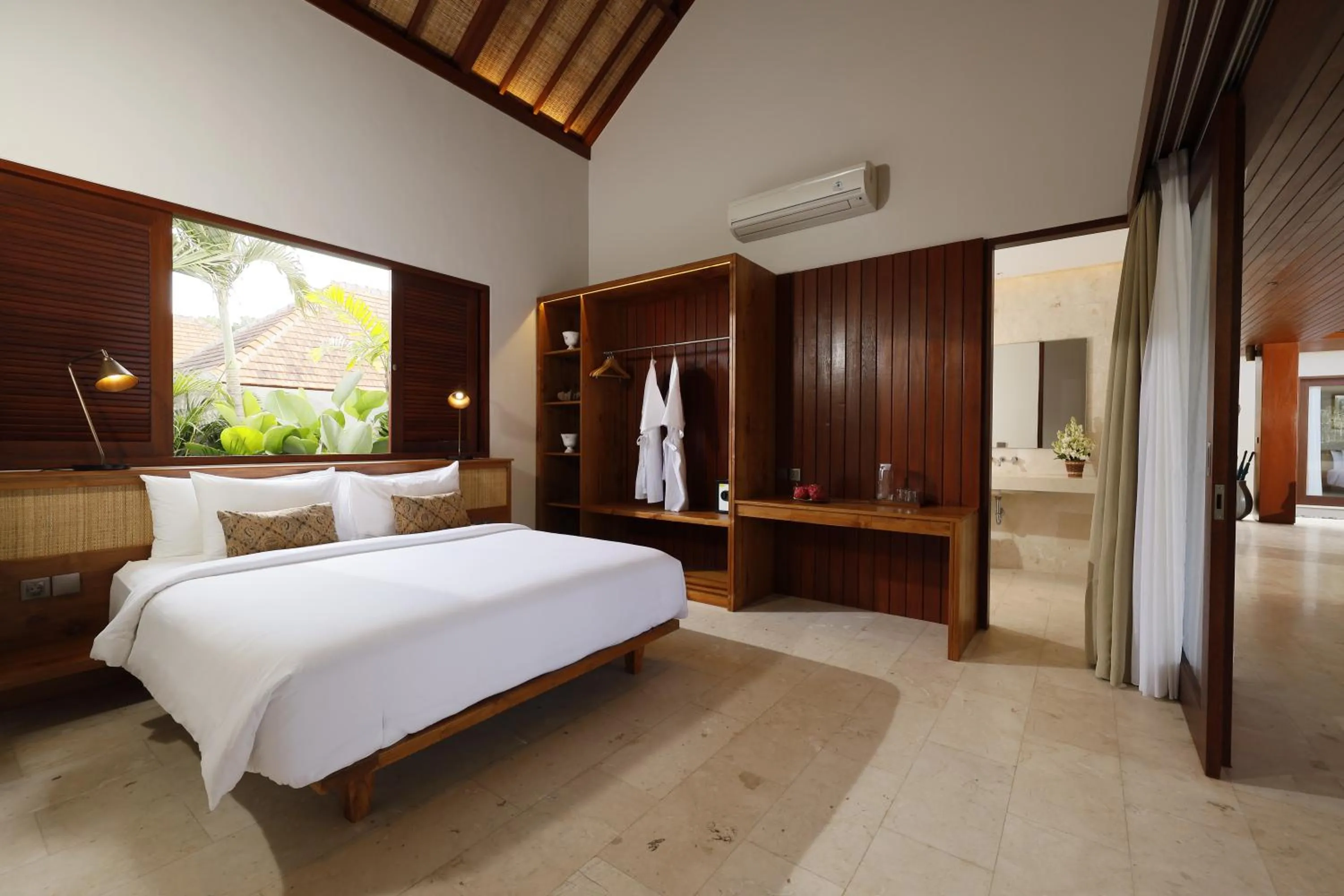 Bed in Amarta Beach Retreat by Nakula