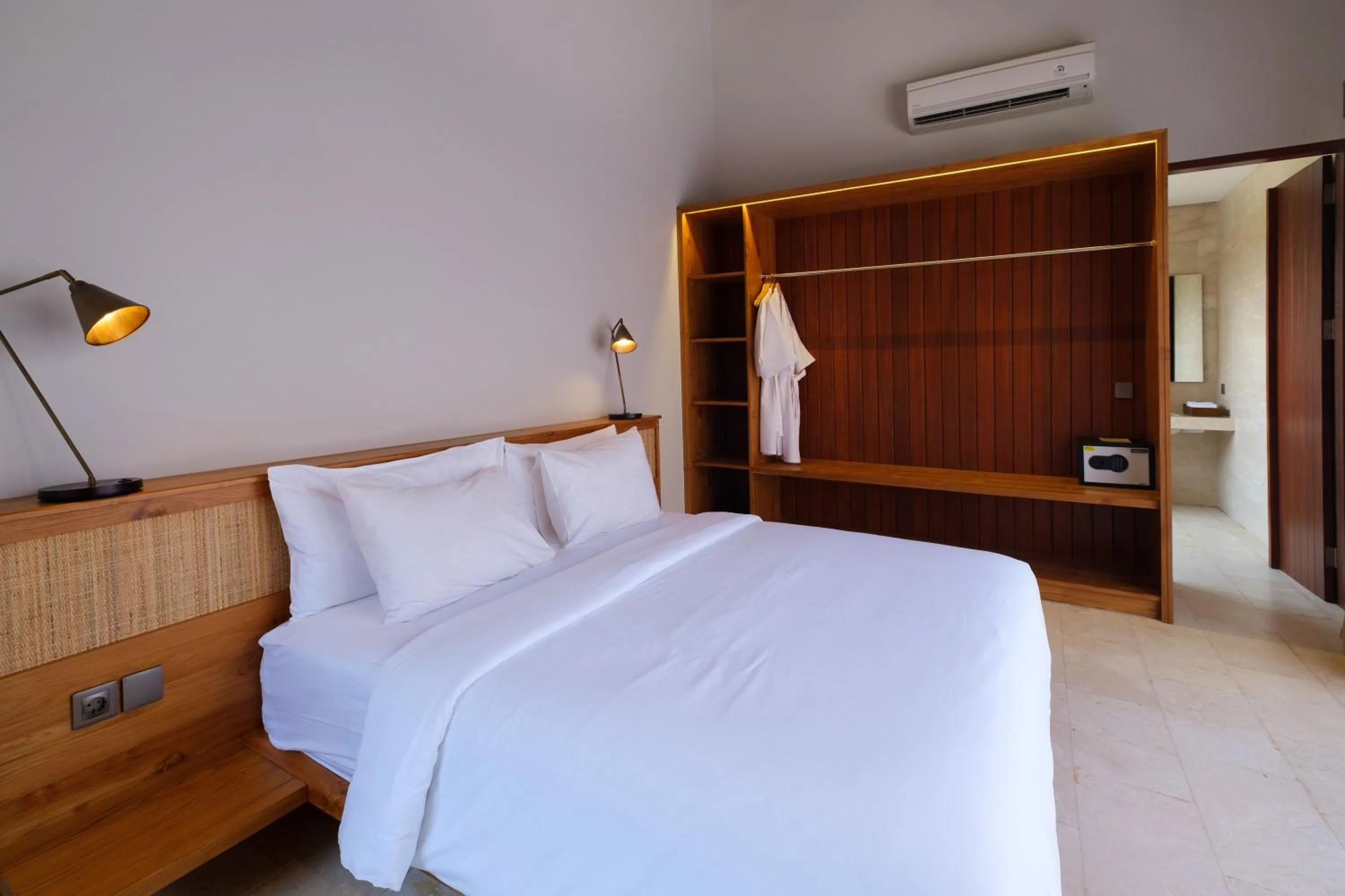 Bed in Amarta Beach Retreat by Nakula